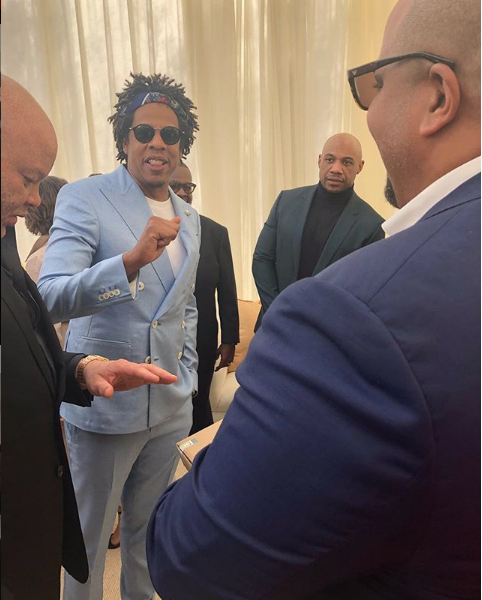 Michel with Roc Nation Founder, Jay-Z