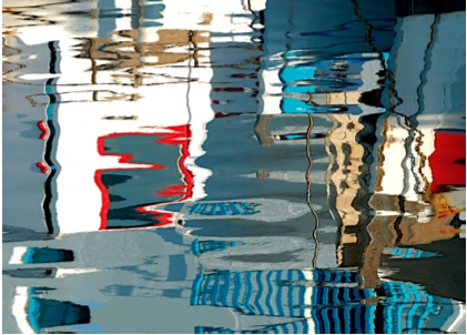 Barbara Vaughn photograph of buildings reflecting in water 