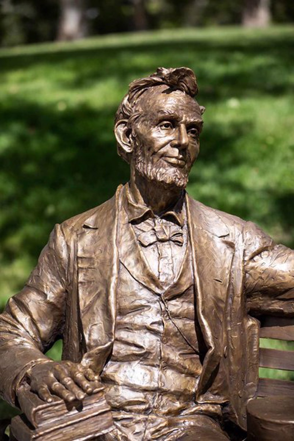 Abraham Lincoln Bench (life - size) by Gary Lee Price