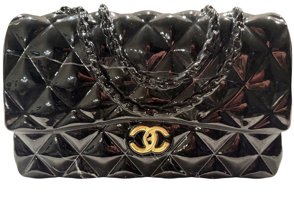 Ayden Snider Chanel Mini Therapy Flap Bag: glossy black marble handbag sculpture with quilted surface, dark chain handles, and gold-toned interlocking-C detail.