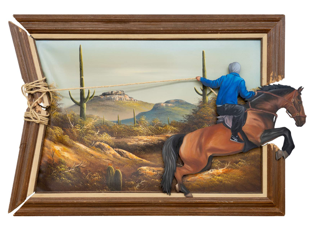 Hijack Wild’n Out: a rider in a blue hoodie on a rearing brown horse extends beyond a framed desert landscape with a rope-bound edge.