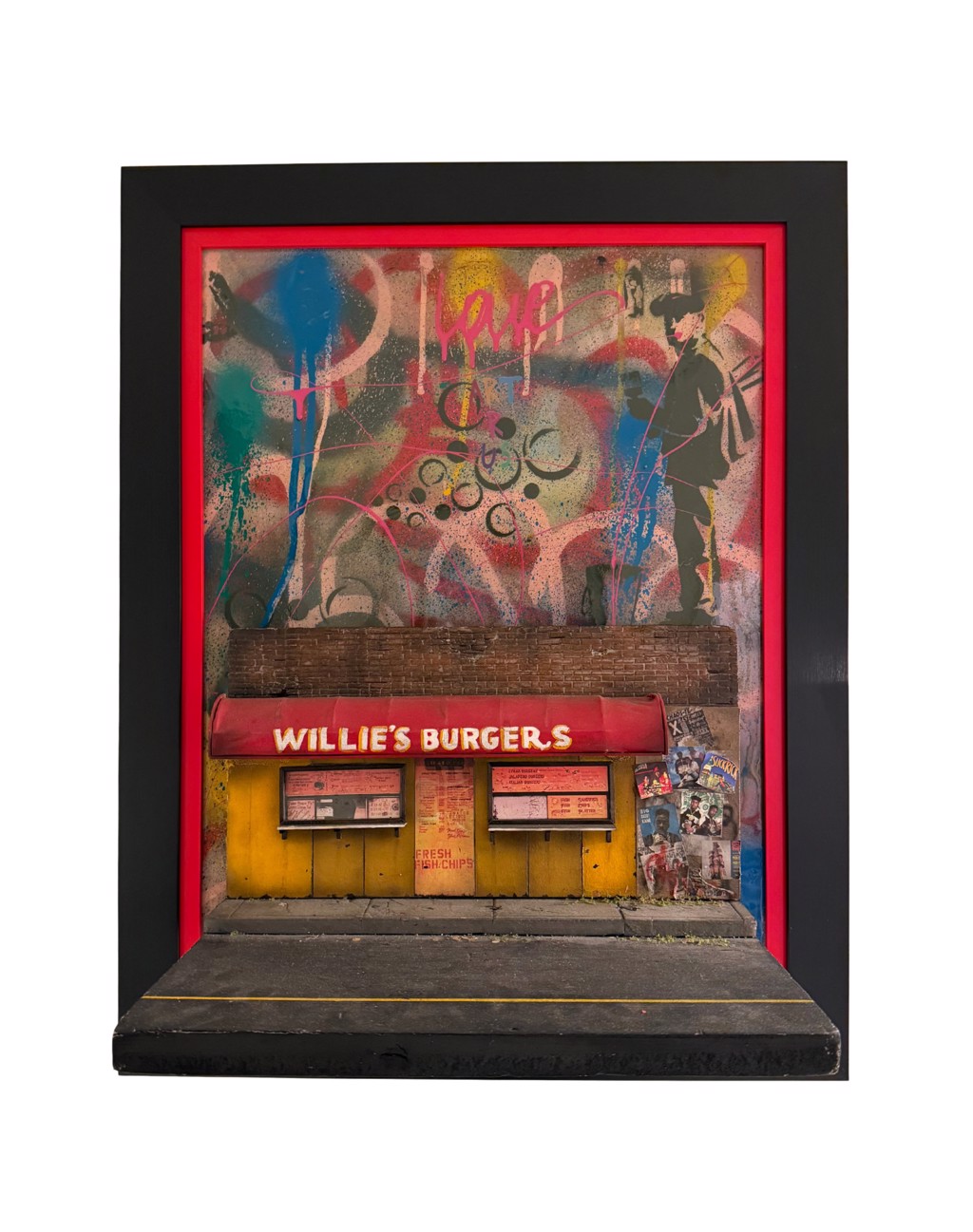 Danny Cortes Willie Burgers with Danny Cortes' 1st Canvas Ever: miniature yellow burger storefront beneath graffiti and colorful drips in a black and red frame.