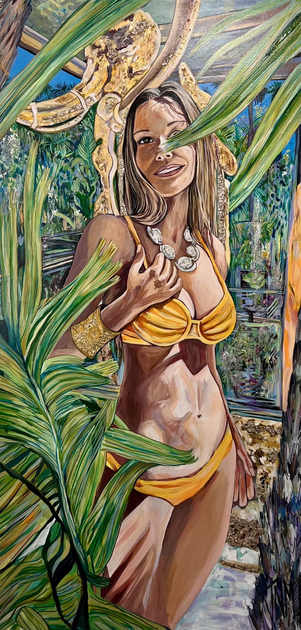 Julianne Marangi Valerie Rose "Lady in the Leaves": woman in a yellow bikini and necklace surrounded by long green tropical leaves.