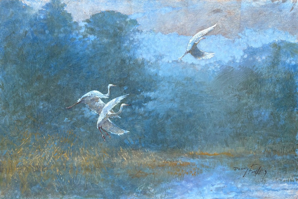 Egrets Flying by Donny Finley