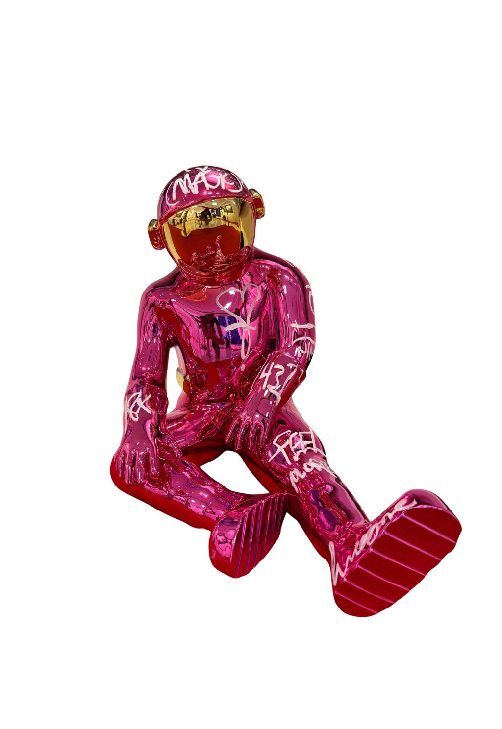 Brendan Murphy The Sitting Spaceman: magenta seated astronaut with extended legs, white handwritten markings, and gold-toned visor.