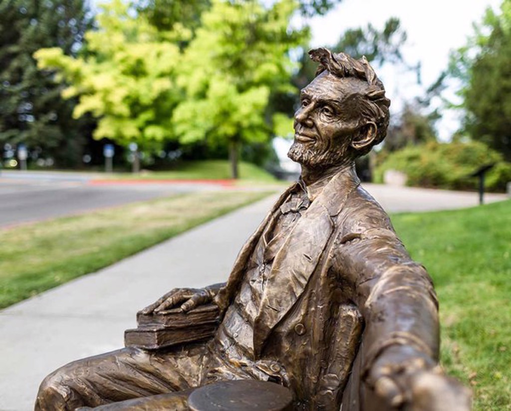 Abraham Lincoln Bench (life - size) by Gary Lee Price