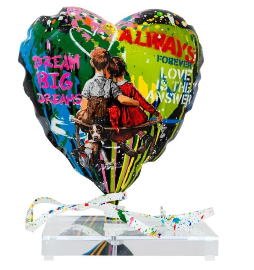 Mr. Brainwash Balloon Heart sculpture showing two seated children, DREAM BIG DREAMS lettering, and an acrylic base.