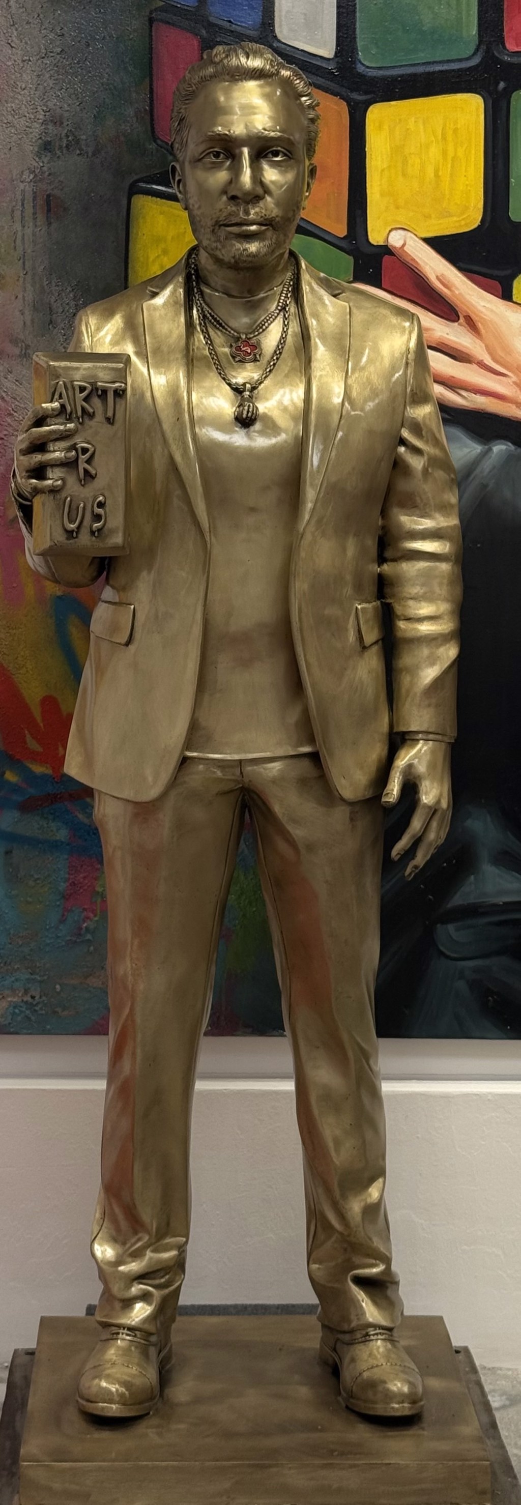 The Gold Standard by Matthew Snider, life-size cast-bronze portrait sculpture
