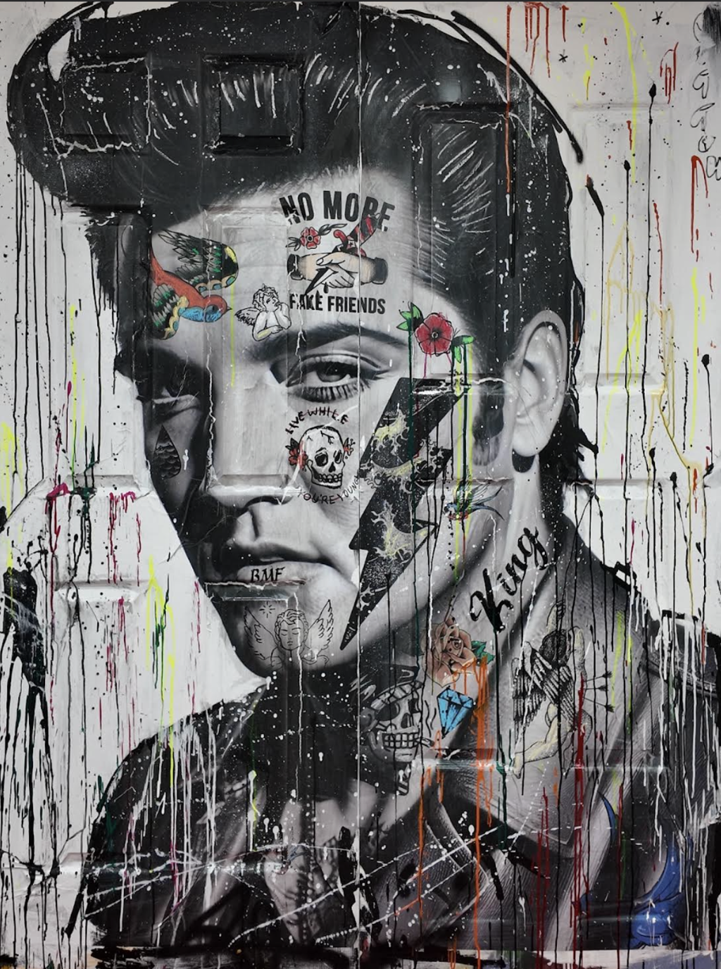 Andrew Cotton Elvis on Doors: grayscale Elvis portrait with tattoo-like flowers, lettering, a skull, a lightning bolt, and long paint drips over door imagery.