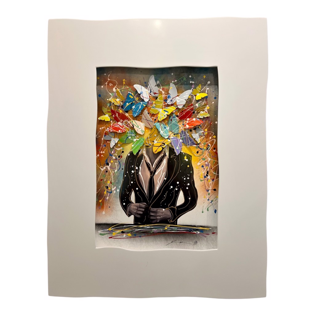 Oz El Hai Fantasy Men: suited grayscale figure whose head is replaced by colorful butterflies amid paint splashes in a white frame.