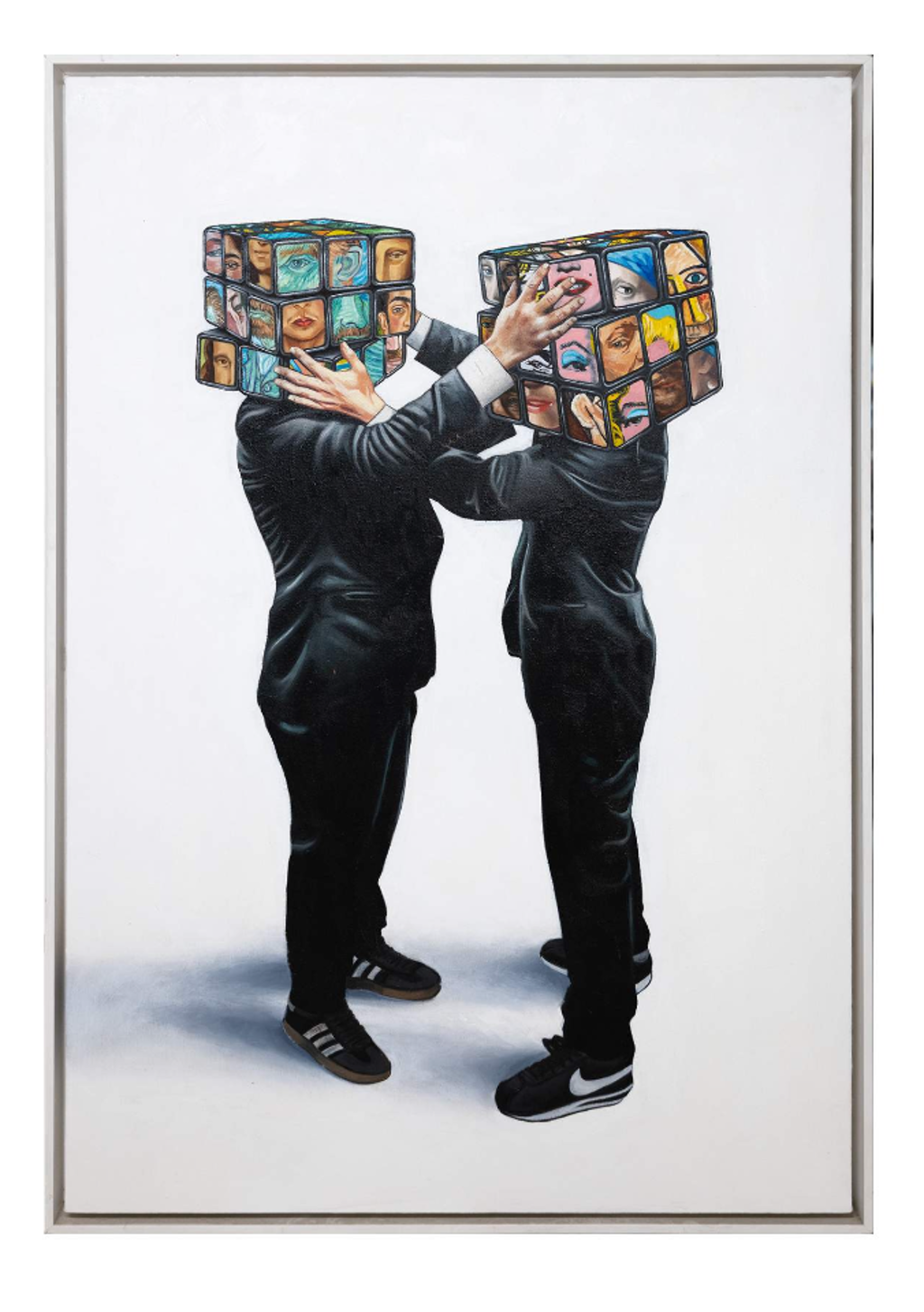 Hijack Puzzled: two black-clad figures with portrait-covered puzzle-cube heads reach toward each other against a pale background.