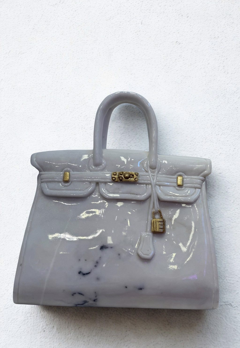 Ayden Snider White & Black Marble Birkin 40: pale marble handbag sculpture with dark veining, curved handles, and gold-toned clasp and padlock.