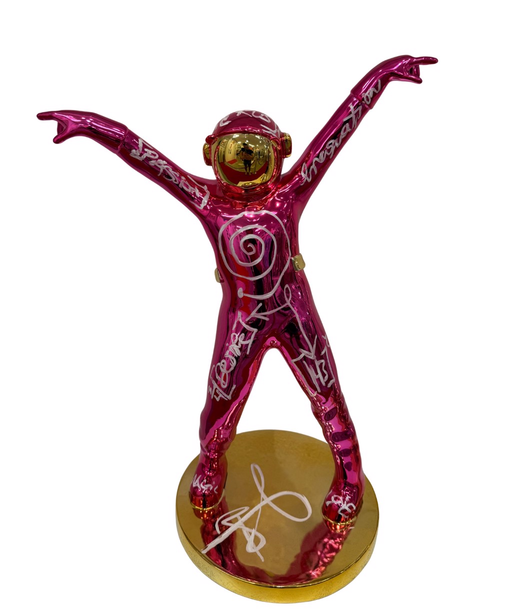 Brendan Murphy The Dancing Spaceman: magenta chrome astronaut with raised arms, white markings, gold-toned visor, and circular base.
