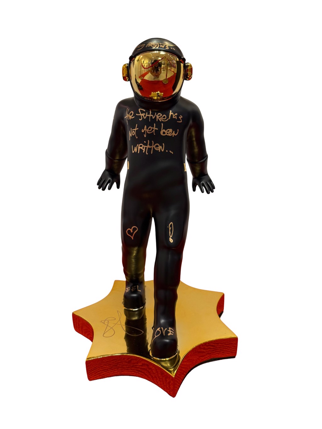 Brendan Murphy Magic: black standing astronaut with gold-colored handwriting, reflective visor, and gold-toned star base.