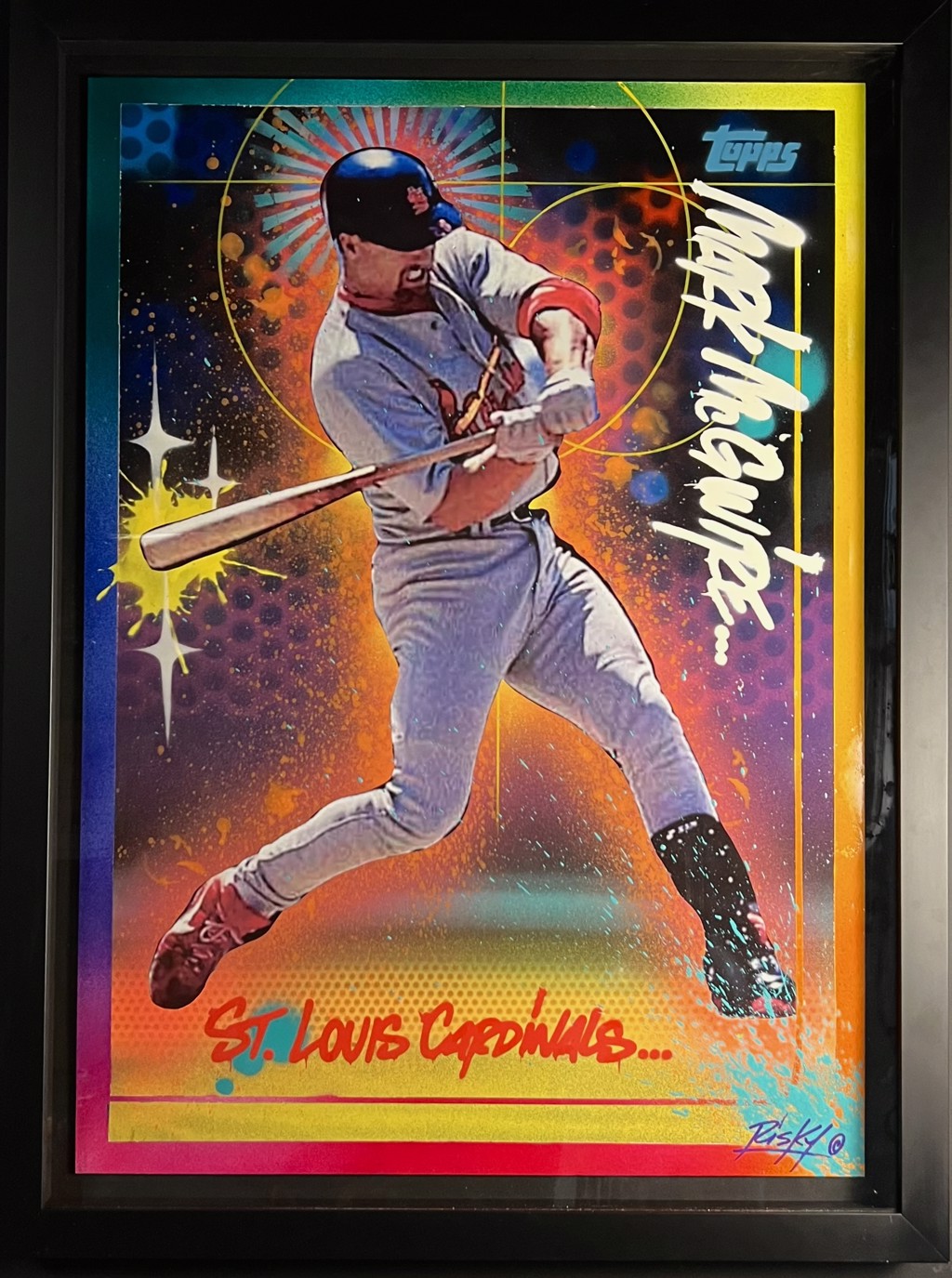 RISK Risk Topps Project 70 "Mark McGwire": Mark McGwire swinging a bat in a Cardinals uniform amid vivid orange-and-purple graphics and vertical name lettering.