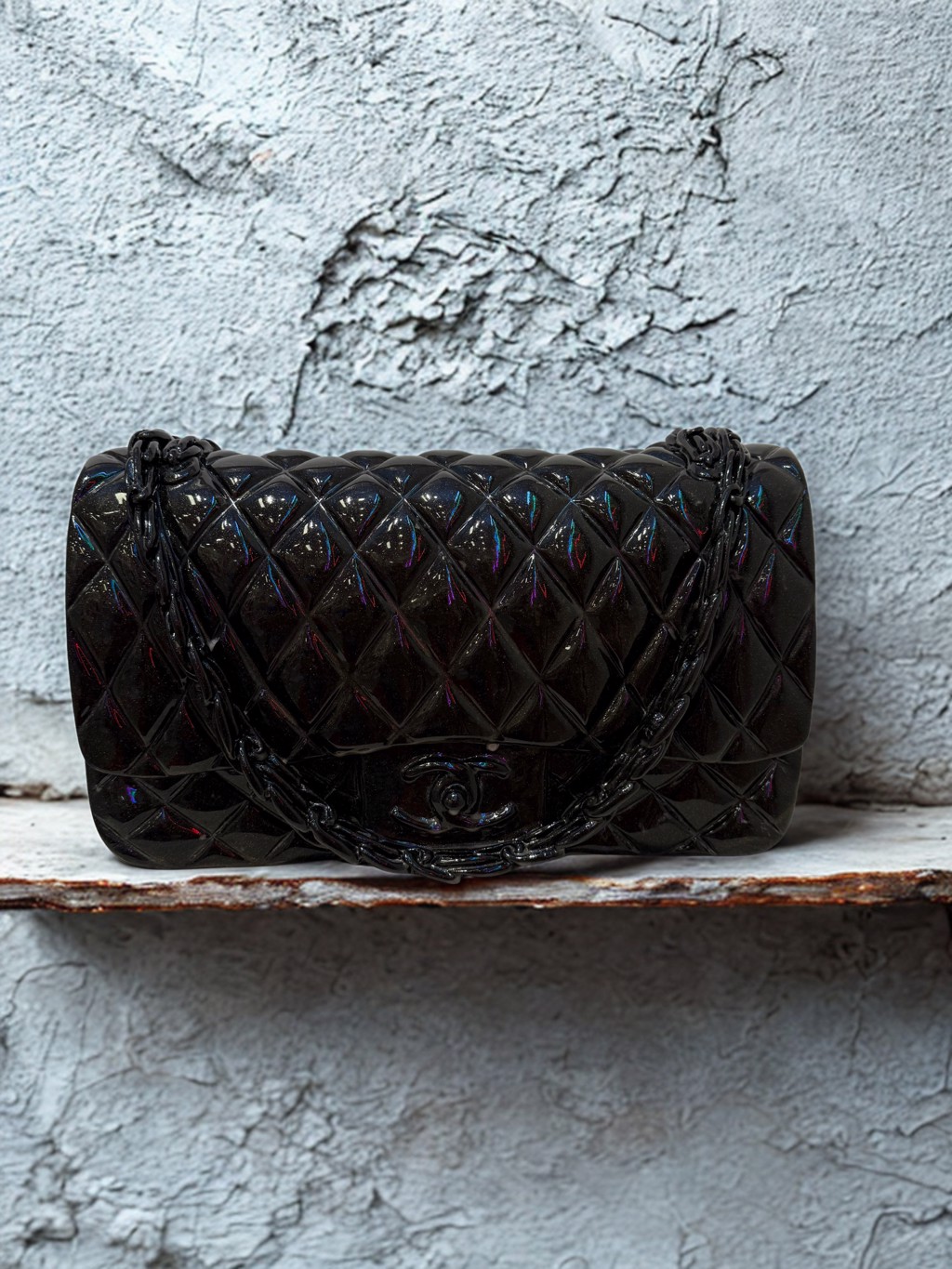 Ayden Snider Black Chanel Marble Therapy Flap Bag: glossy black marble flap-bag sculpture with diamond quilting and draped chain detail.