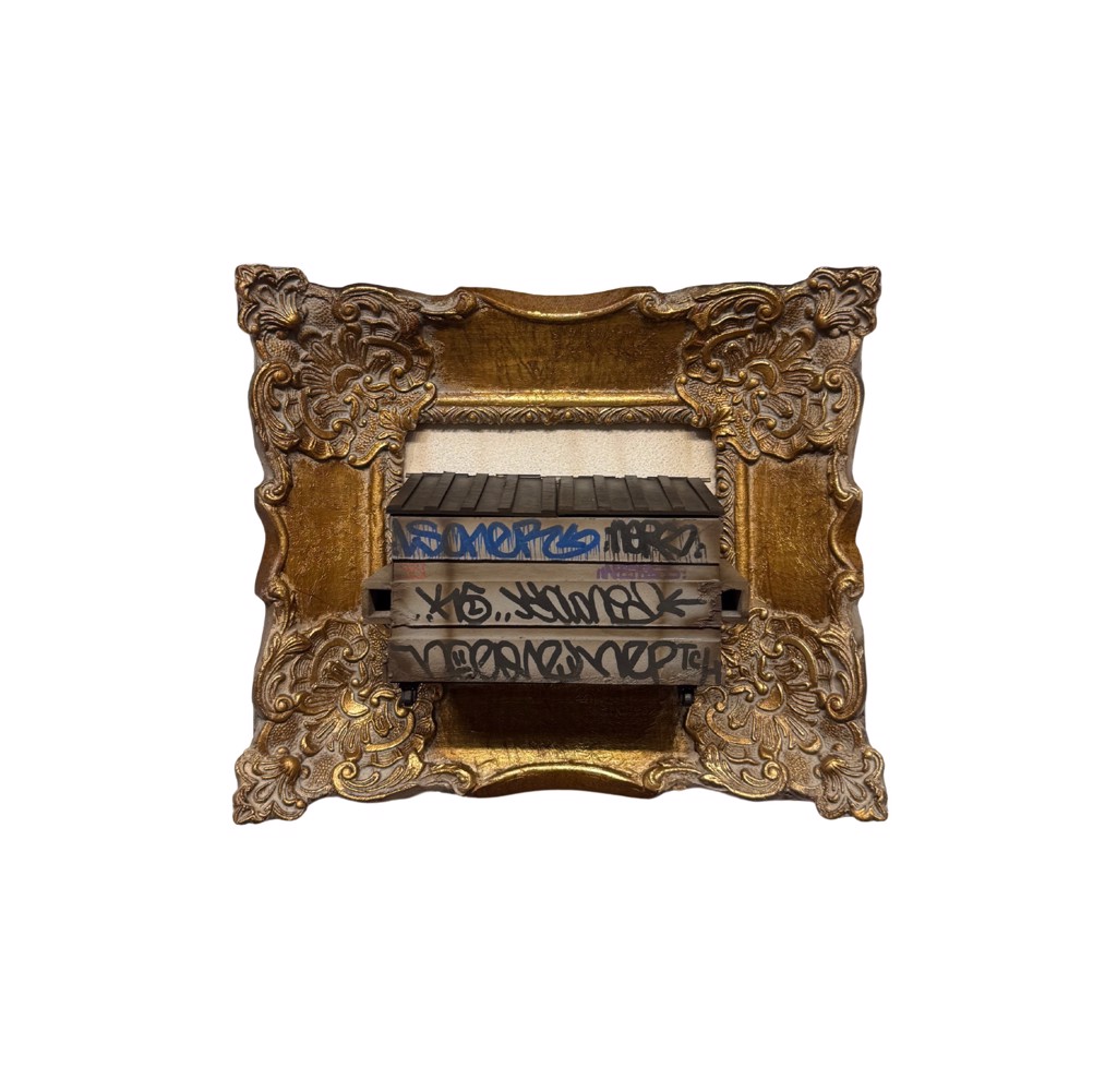 Danny Cortes Small Grey Dumpster: miniature grey dumpster with blue and black graffiti inside an ornate gold-toned frame.