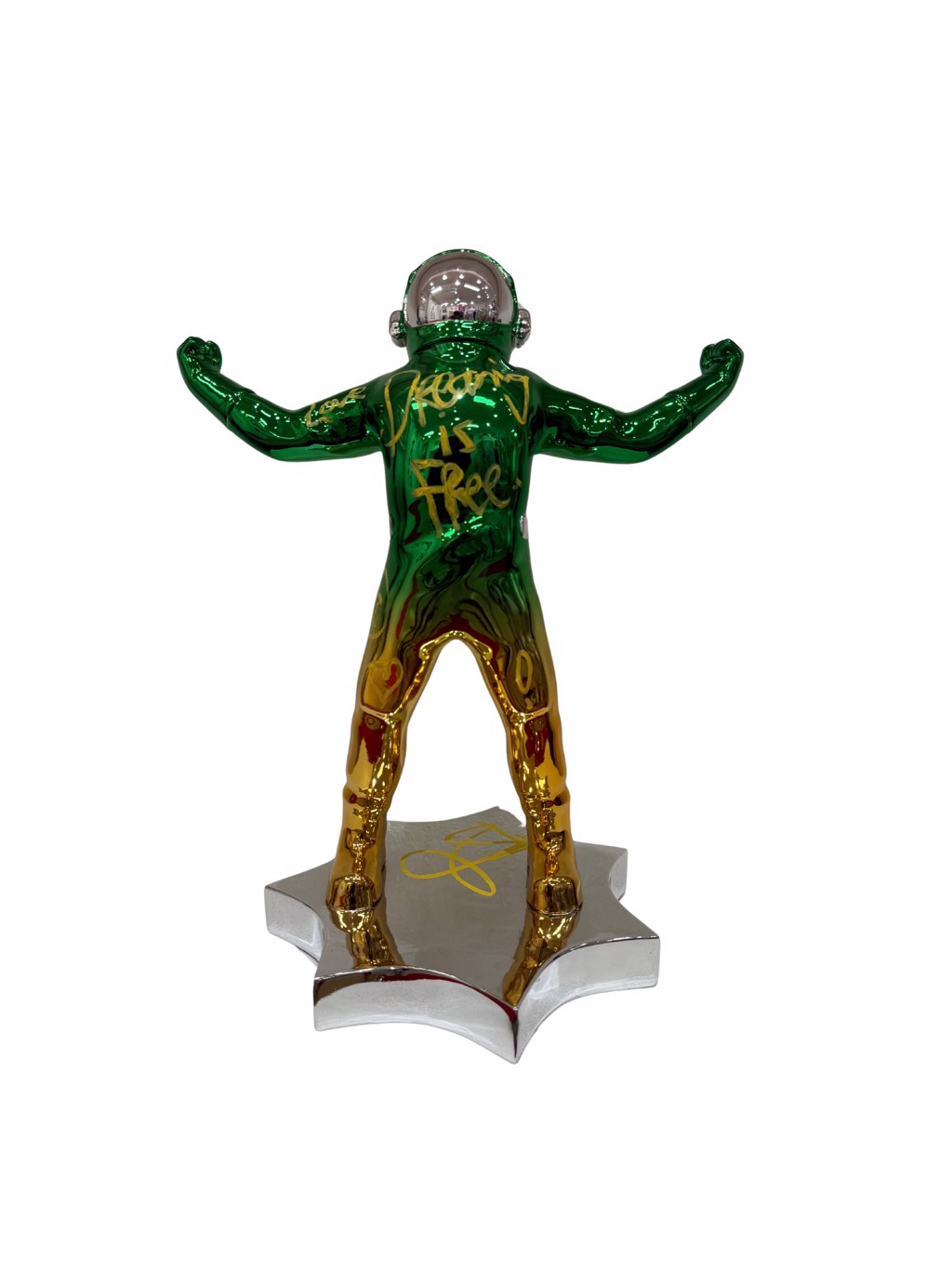 Brendan Murphy Wide Open: green and gold-toned chrome astronaut with open arms, yellow handwriting, and silver-toned star base.
