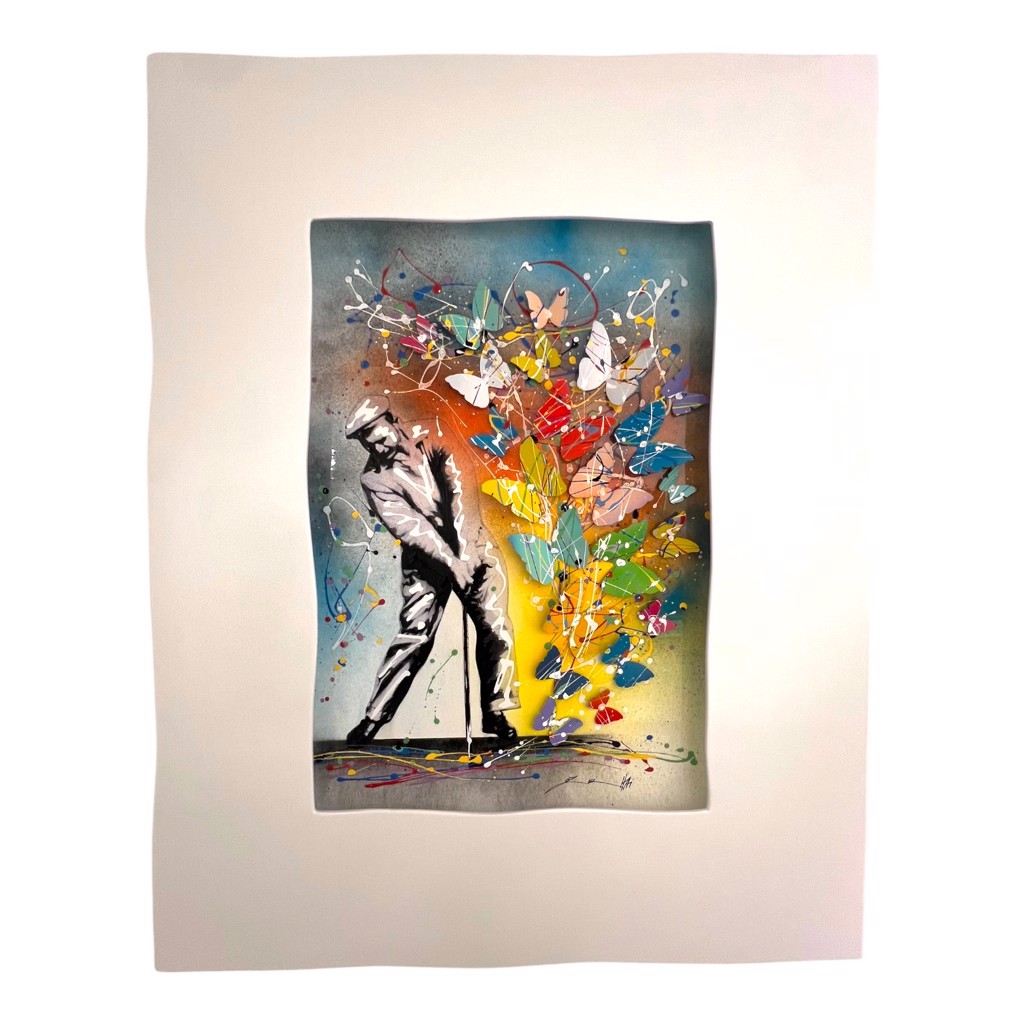 Oz El Hai Fantasy Golfer: black-and-white golfer beside a rising stream of colorful dimensional butterflies in a white frame.