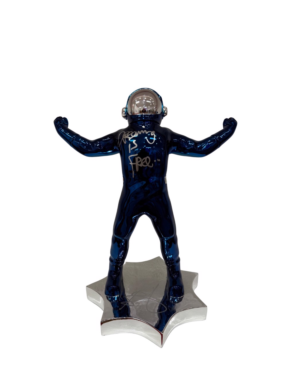 Brendan Murphy Wide Open: deep blue chrome astronaut with open arms, handwritten markings, silver-toned visor, and star-shaped base.
