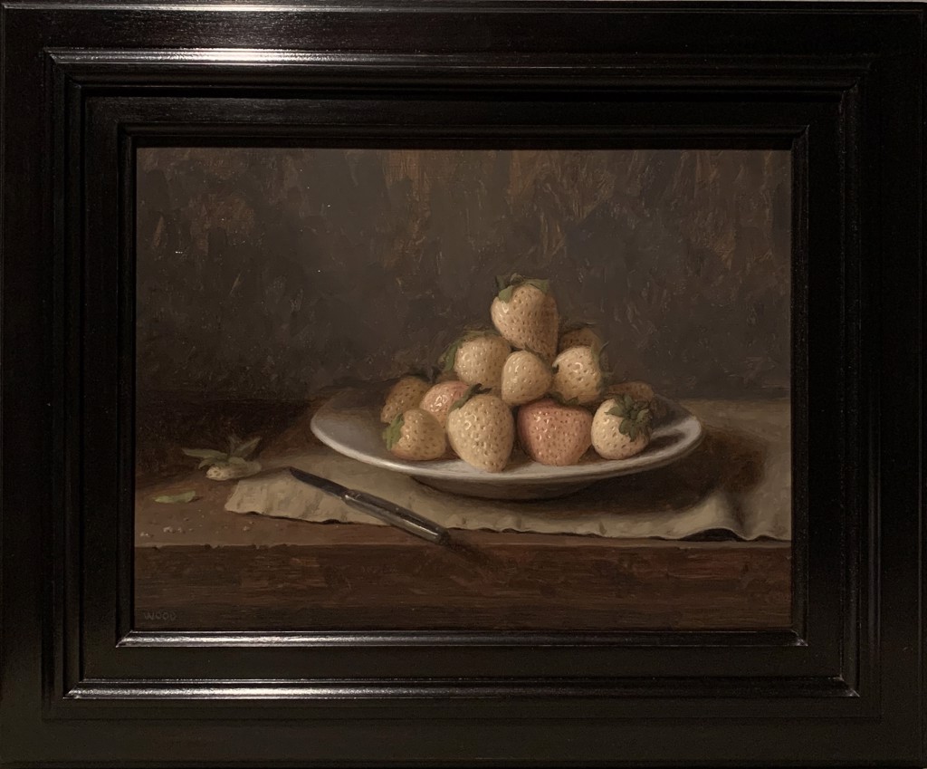 Justin Wood's 'Pineberries,' an oil painting showing unique white strawberries on a ceramic plate with a knife beside, on a wooden surface