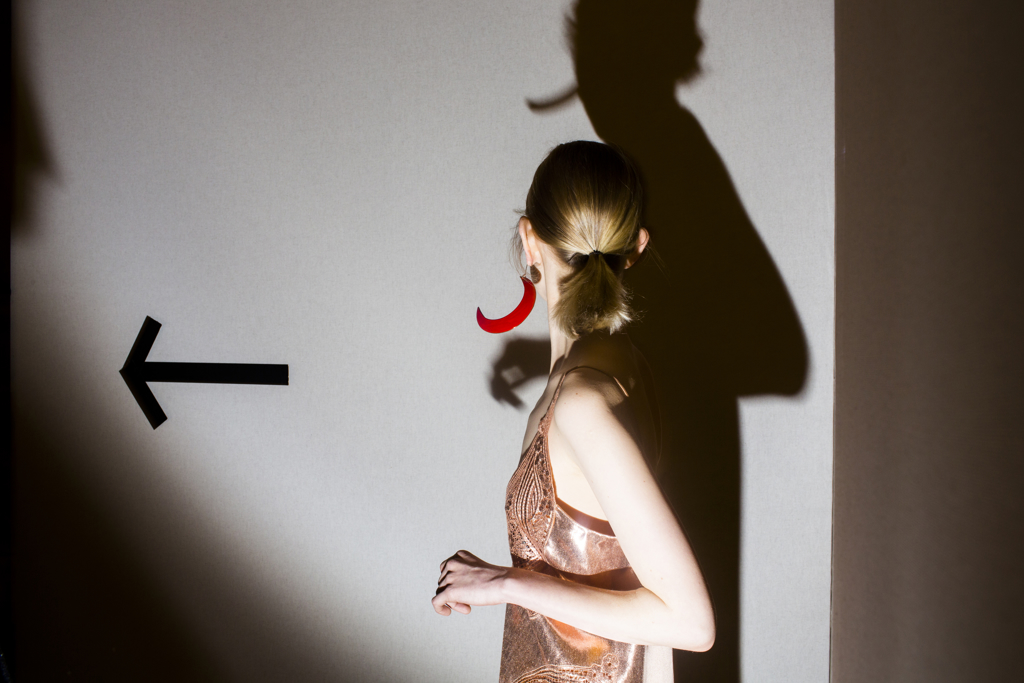 Stella McCartney (Red Earring with Arrow) by Landon Nordeman