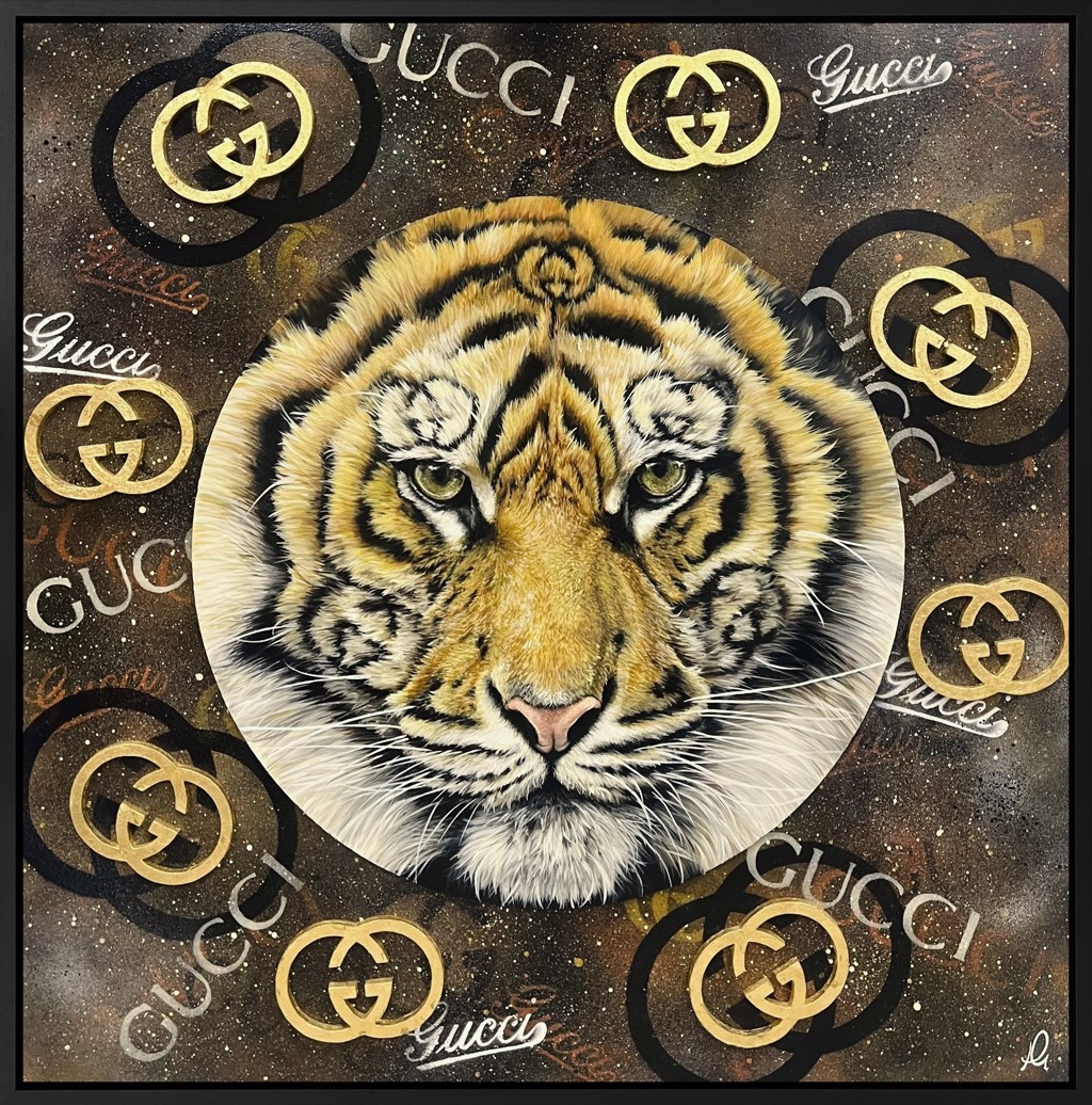 Hayley Goodhead Golden Gucci: frontal tiger portrait surrounded by gold Gucci motifs on a dark speckled background.