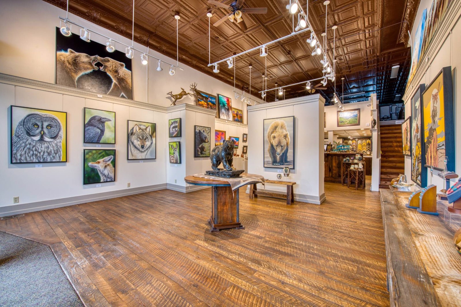 The main gallery under the original tin ceiling
