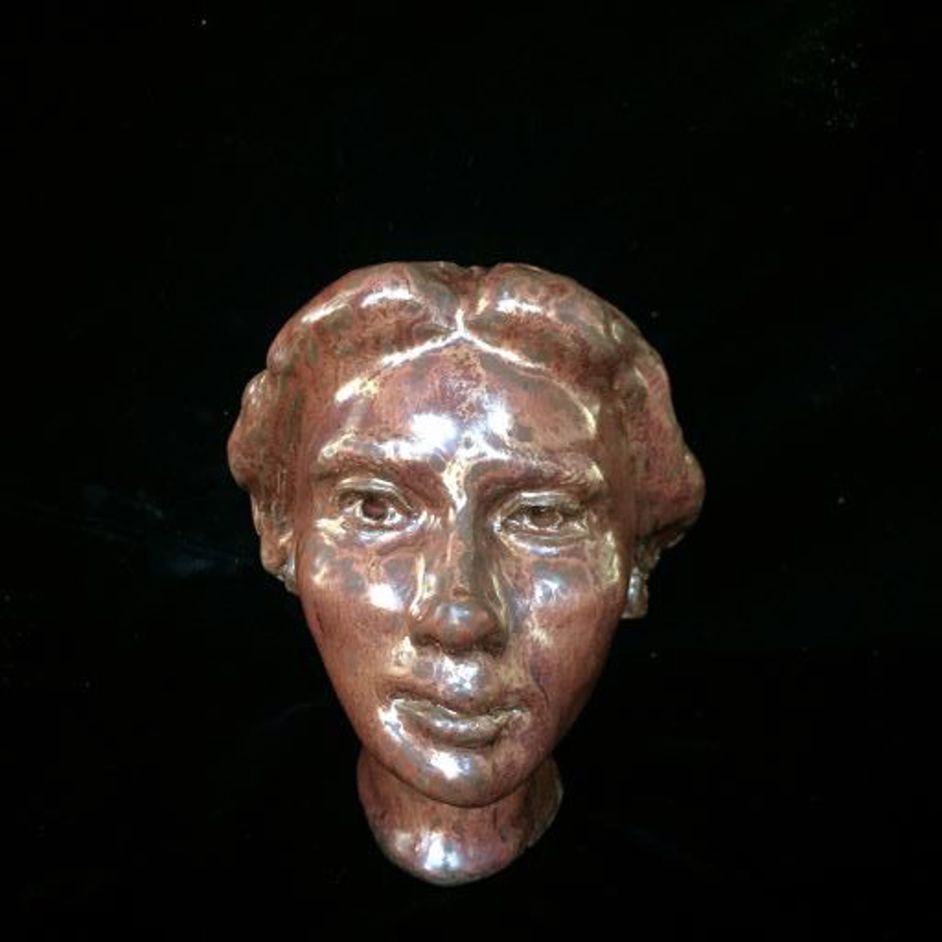 Ancient Copper Woman with Bun by Michael Hagan