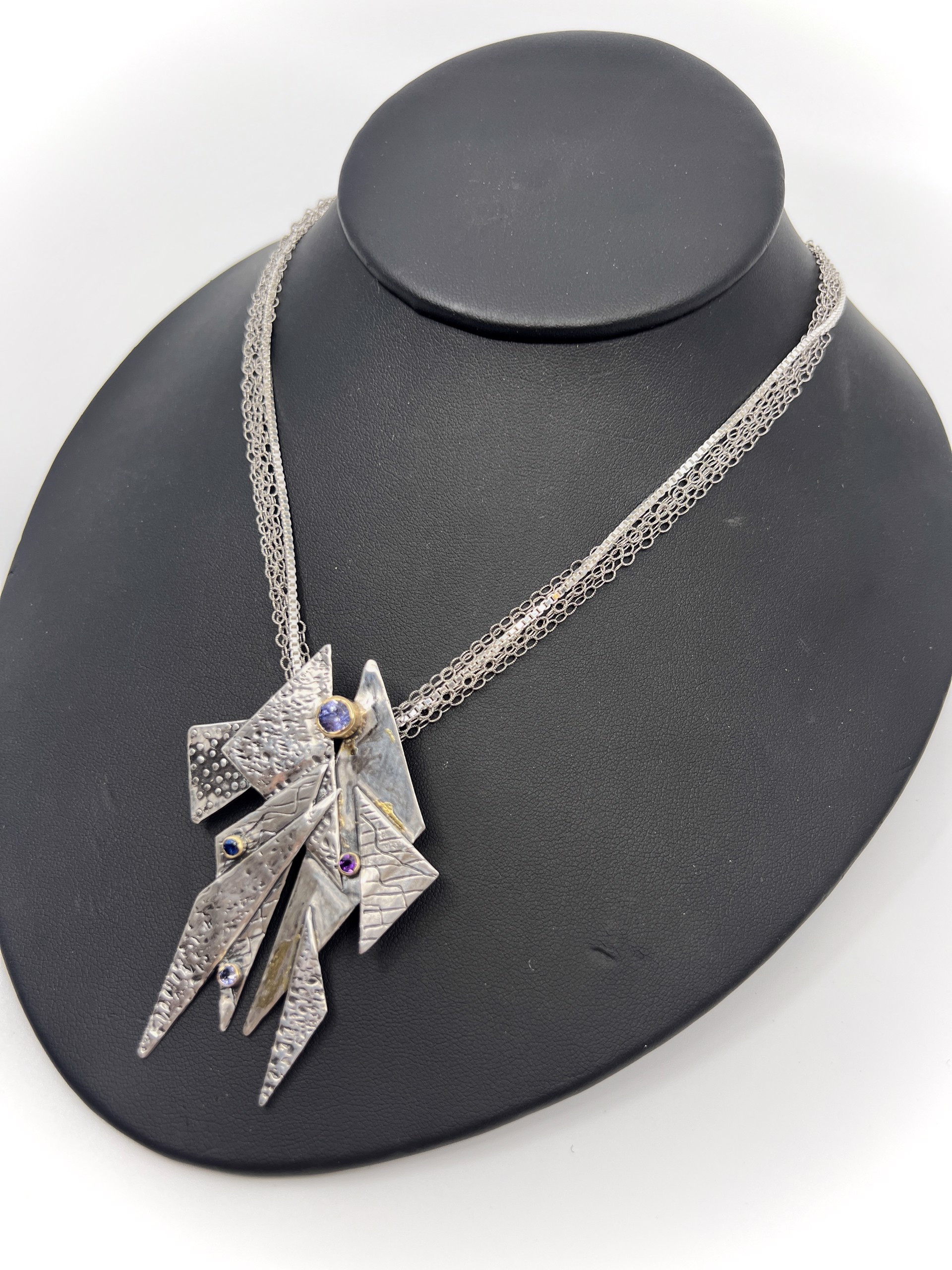 9602 Silver and Gold Multi-Triangle Pendant with Tranzanite, Saphire, and Garnet with Double Chain by Beth Benowich