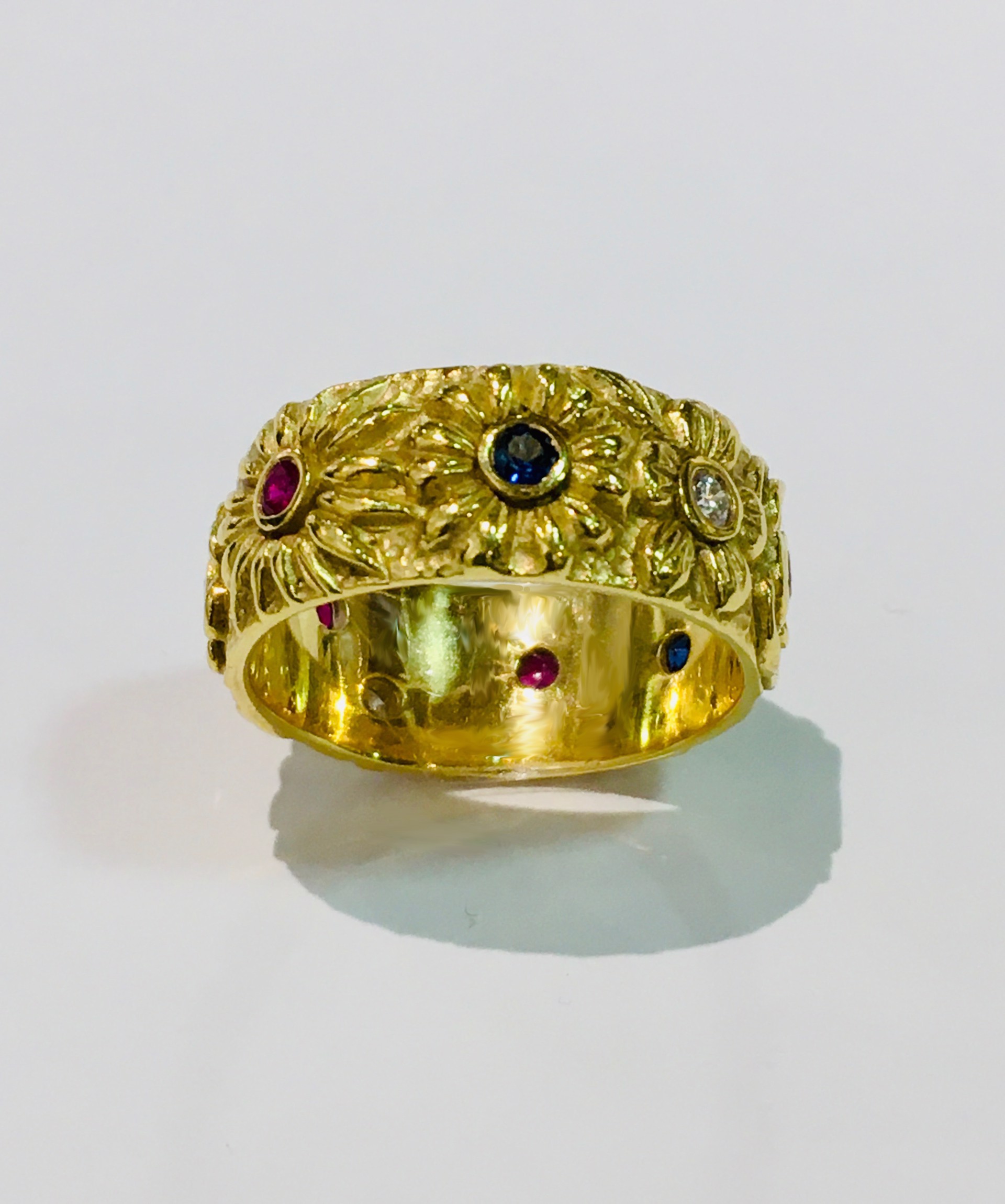 Sapphires, Garnets, and Diamonds in 18kt Yellow Gold, Floral Thick Band Ring by DIANA HEIMANN