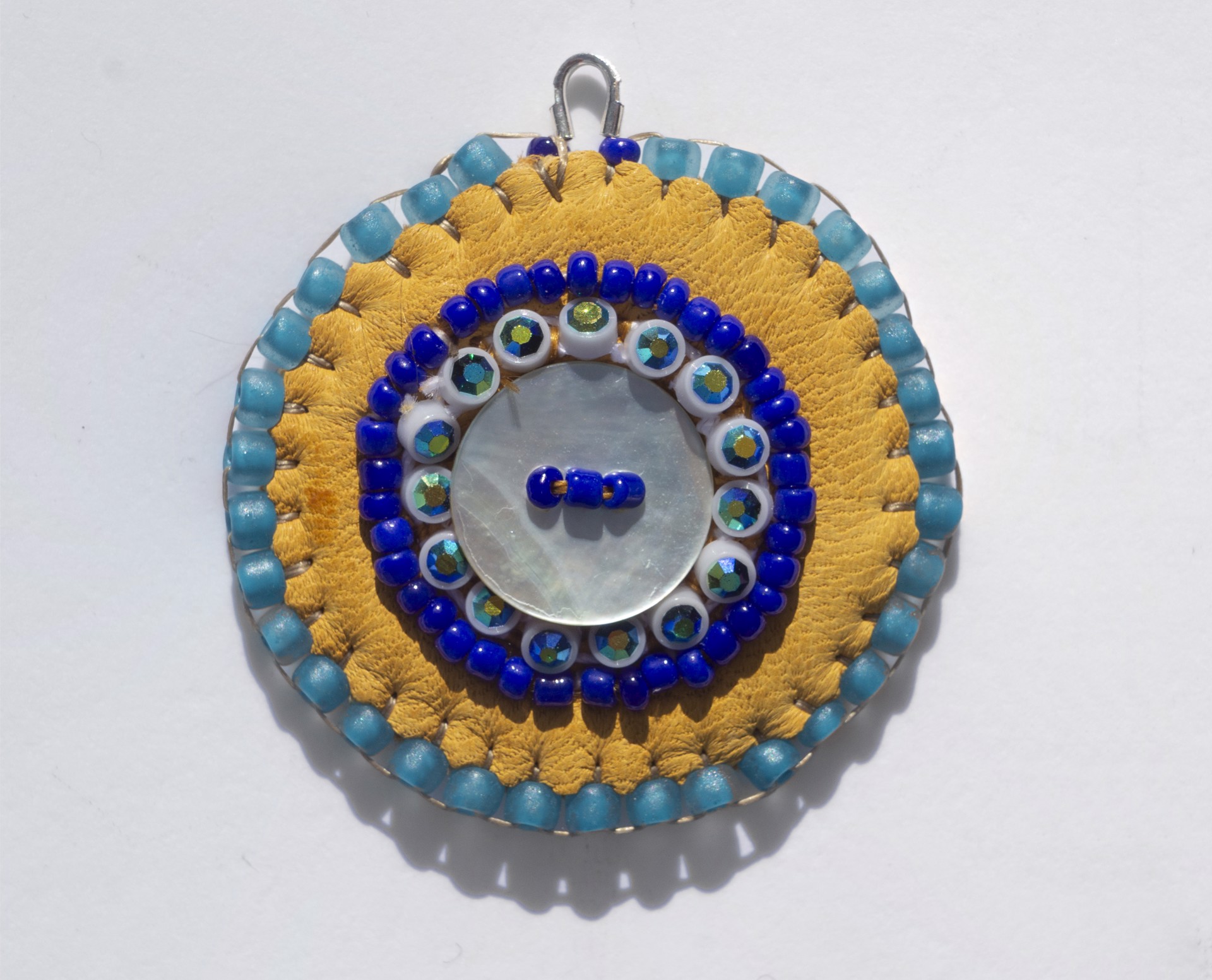 Blue Button Pendant by Hattie Lee Mendoza