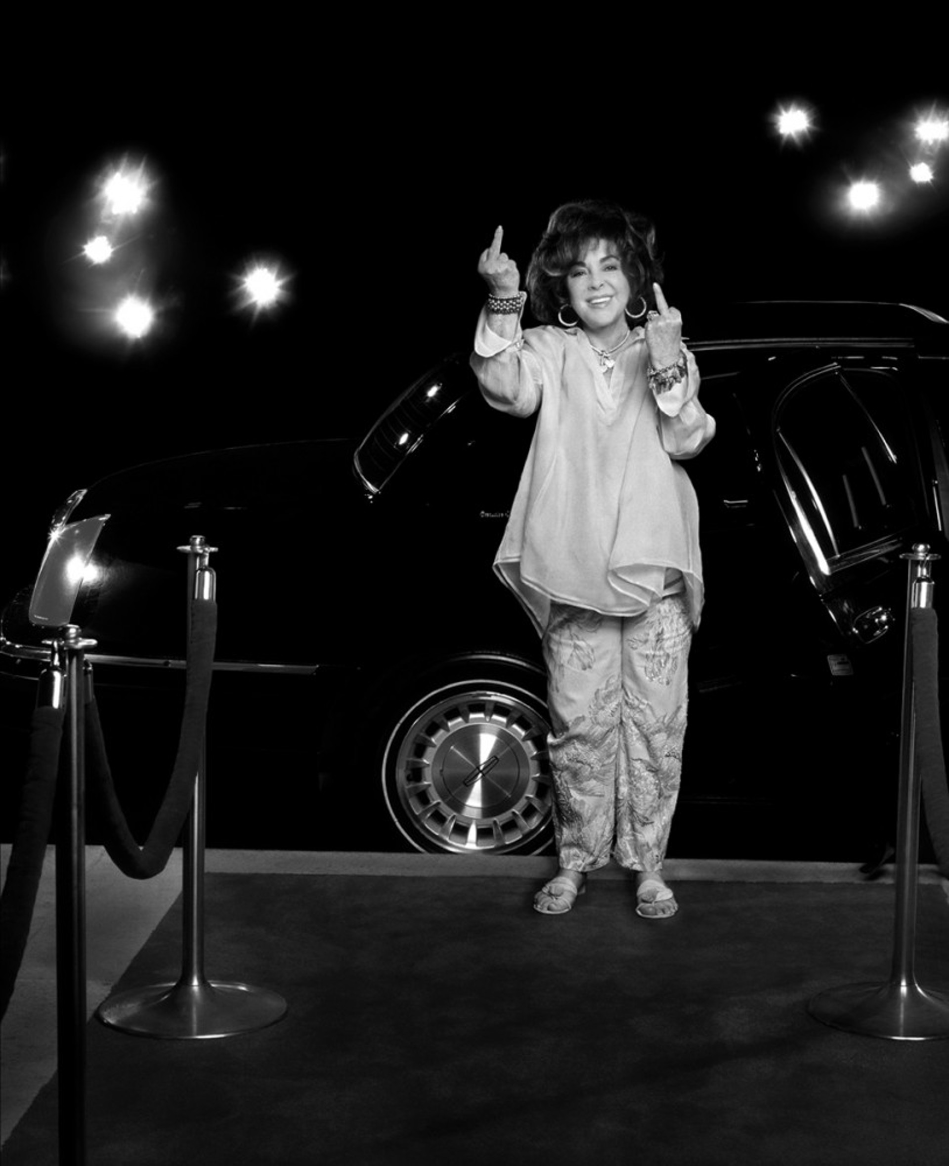 00081 Elizabeth Taylor Off Outside of Limo BW by Timothy White