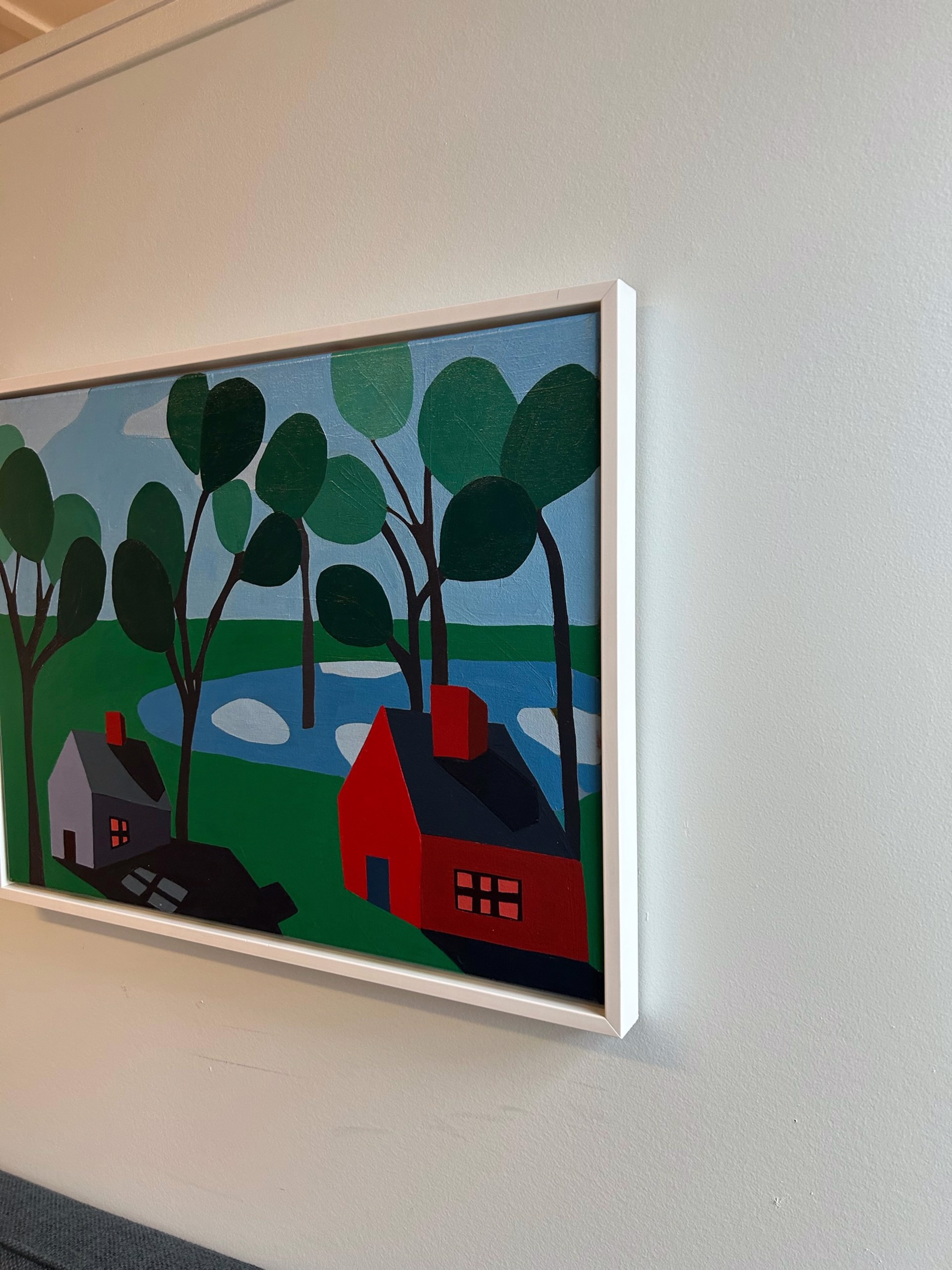 Red House and Gray House in Forest with Lights On by Sage Tucker-Ketcham
