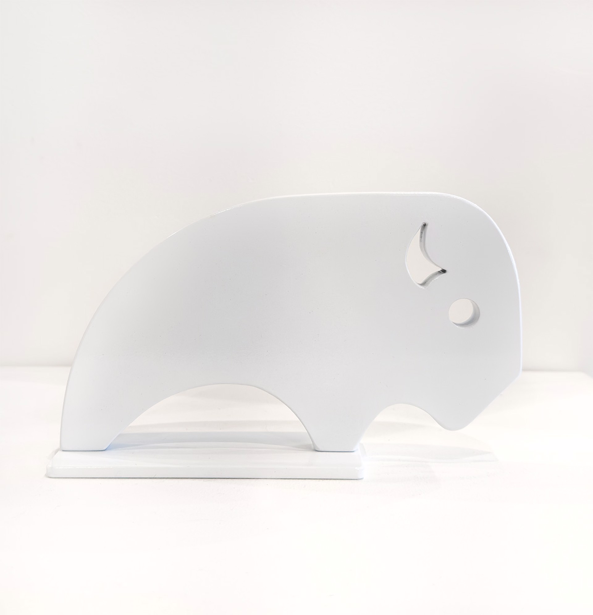 Miniature Sculpture By Jeffie Brewer Featuring A White Buffalo In Simplified Shapes