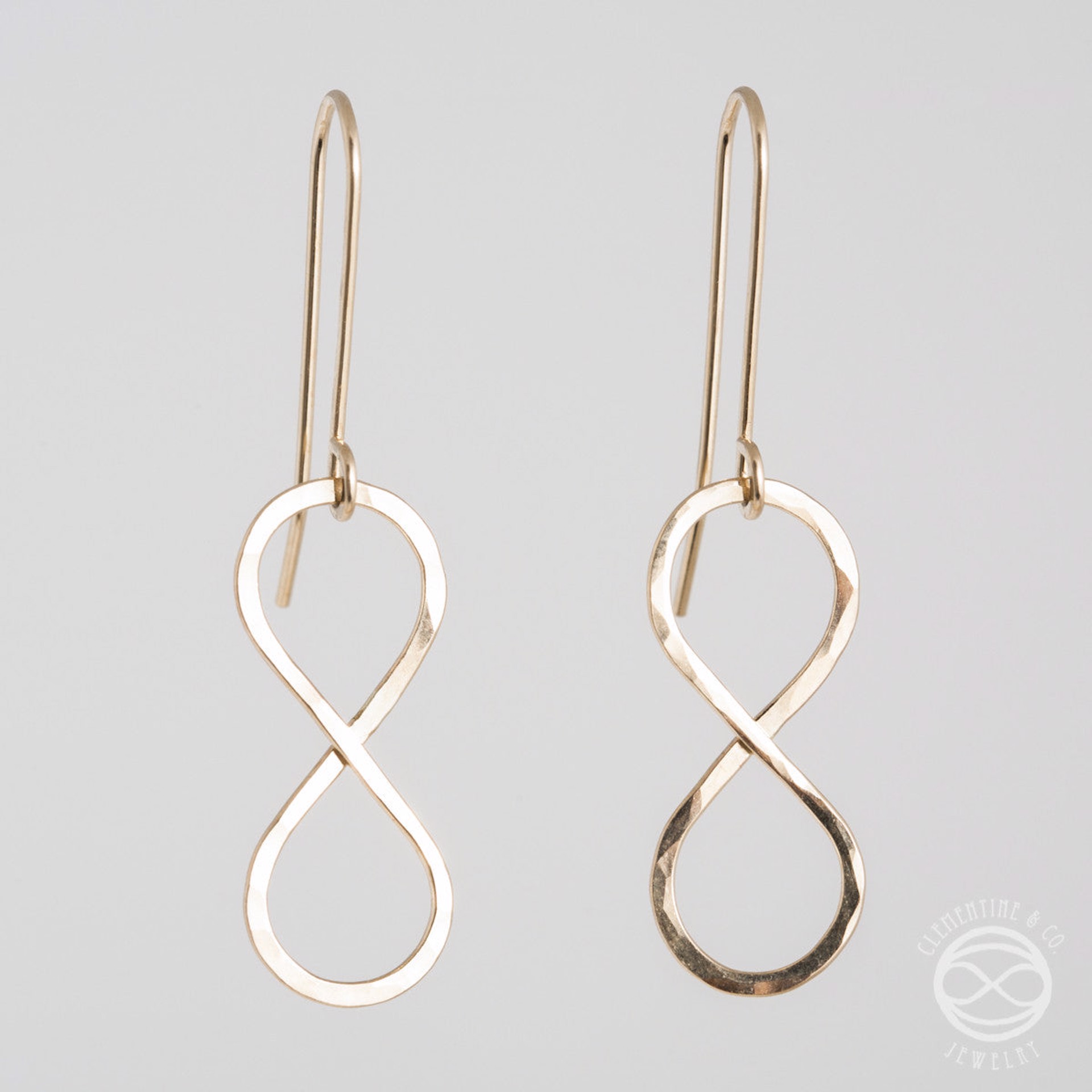 Infinity Earrings in Gold by Clementine & Co. Jewelry