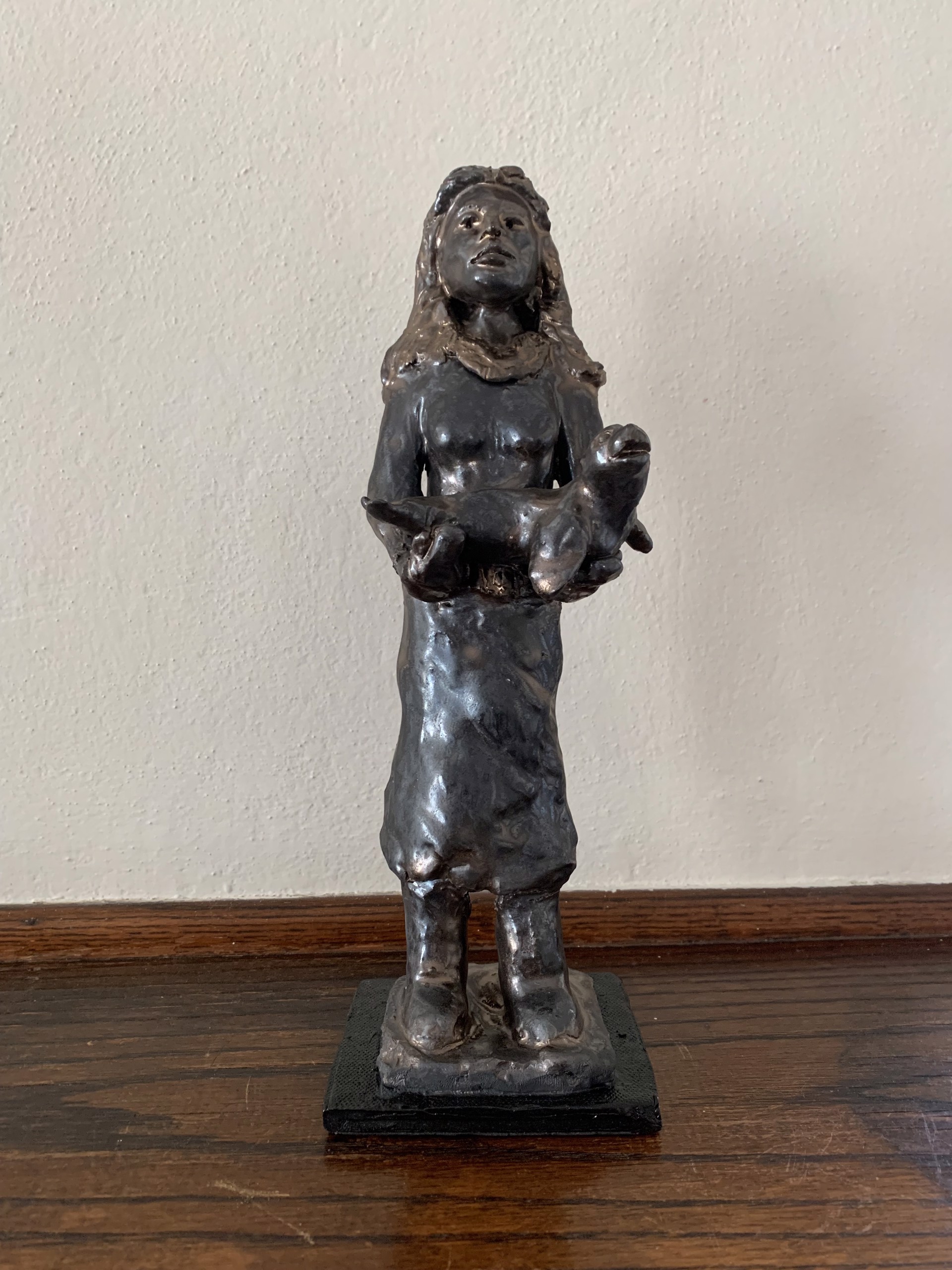 Bronze Glaze Woman with Seal by Michael Hagan
