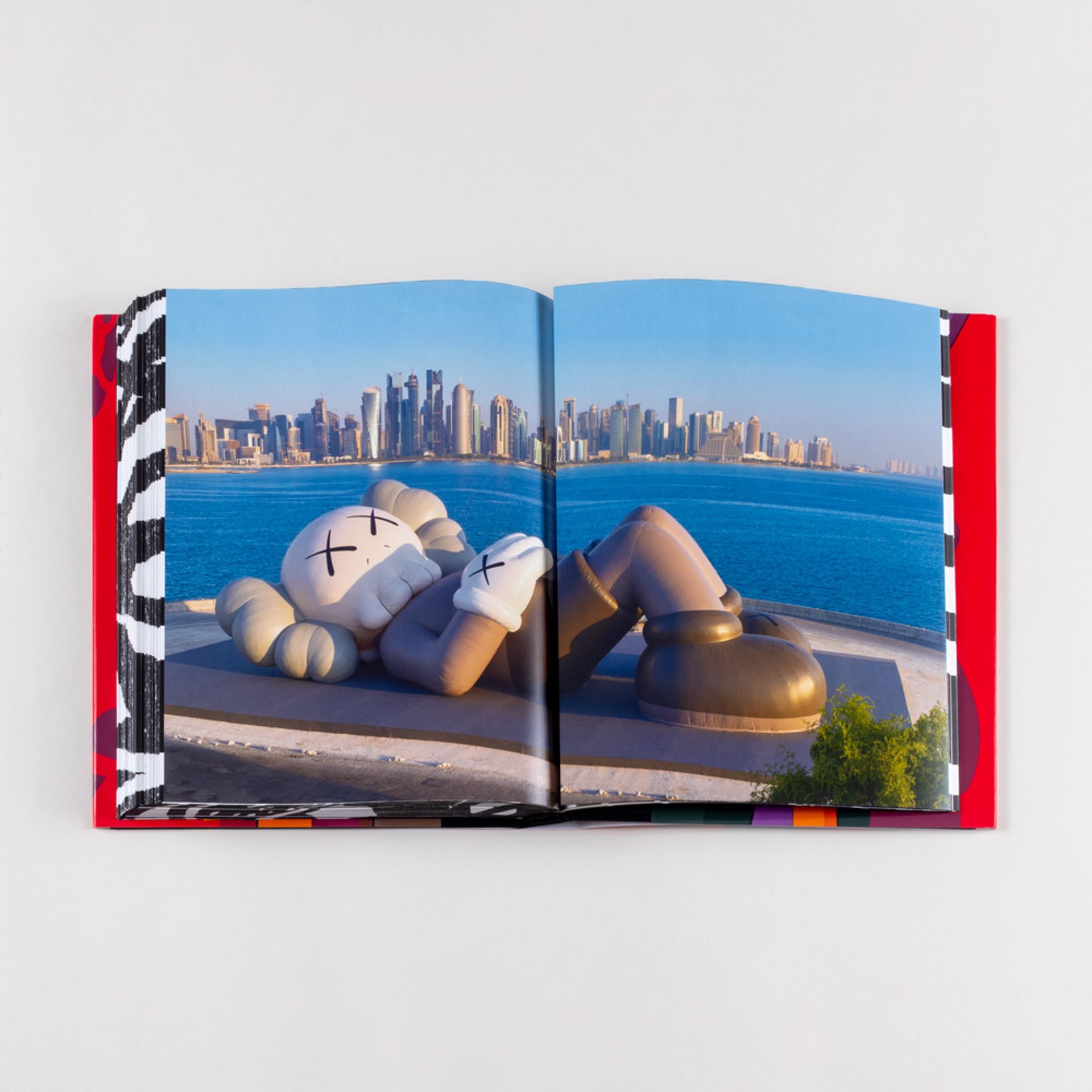 KAWS: He Eats Alone by KAWS