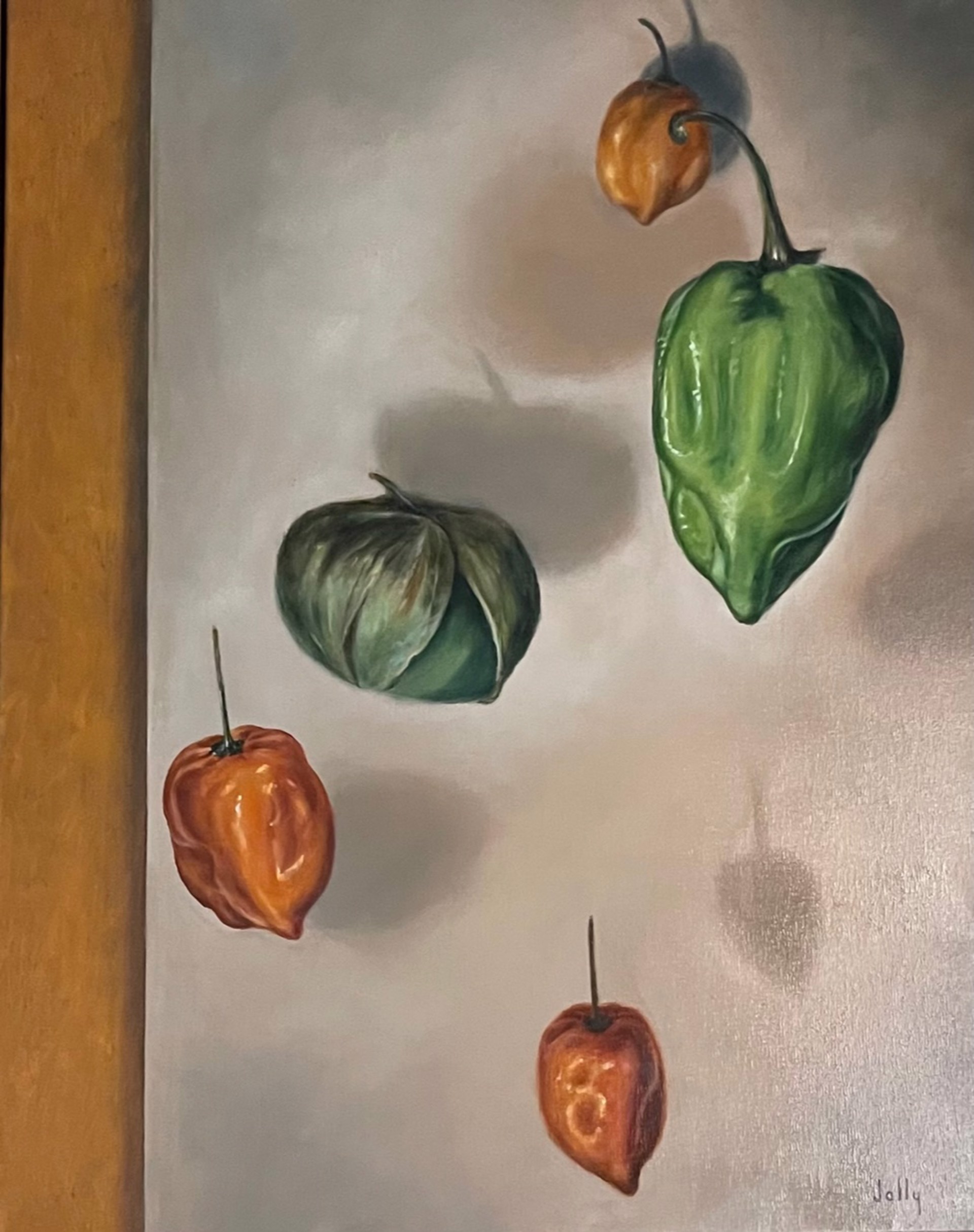 Floating Peppers on Orange by Lawrence Jolly