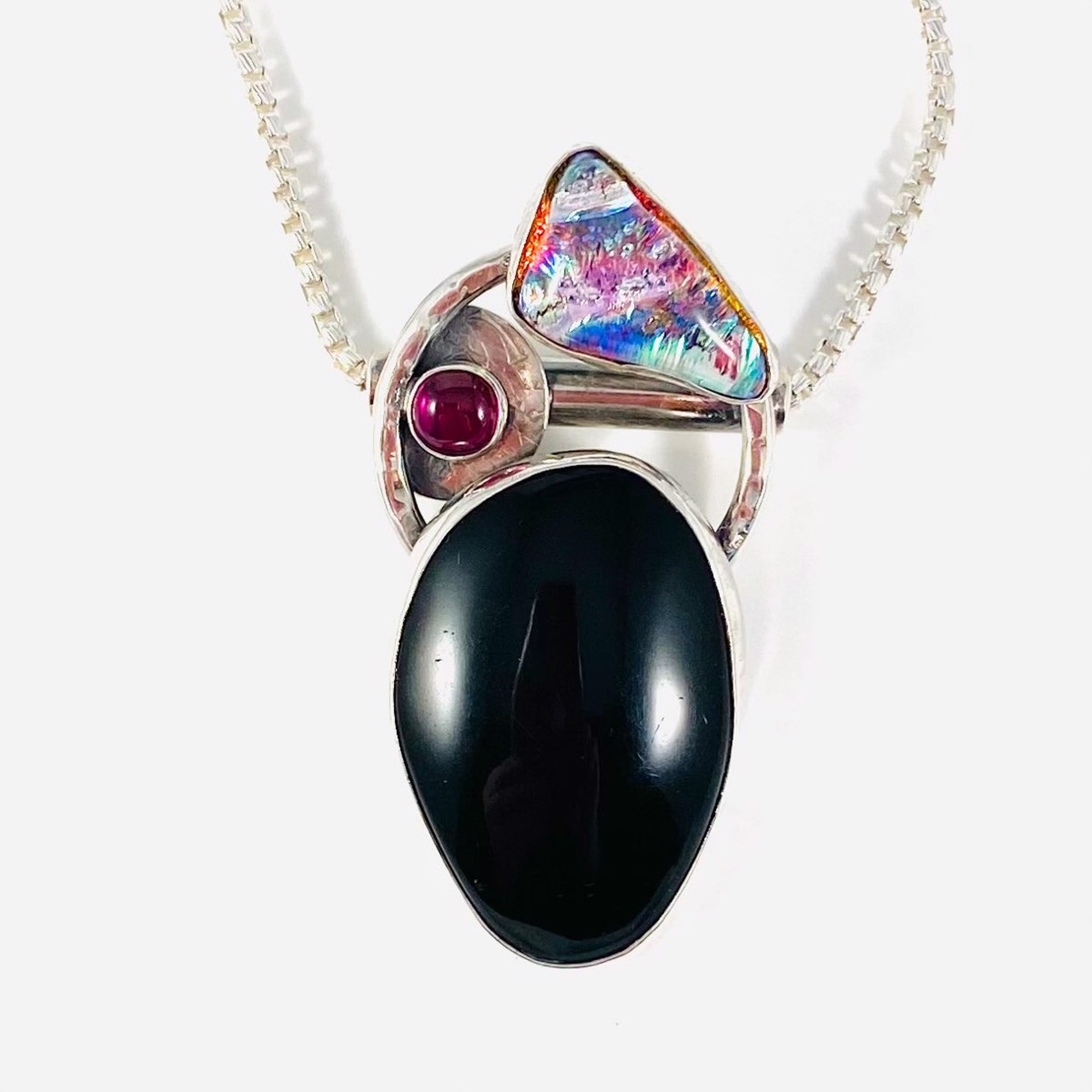 Black Pyrite, Dichroic Glass, Ruby CZ Pendant on 18”ss box chain AB22-18 by Anne Bivens