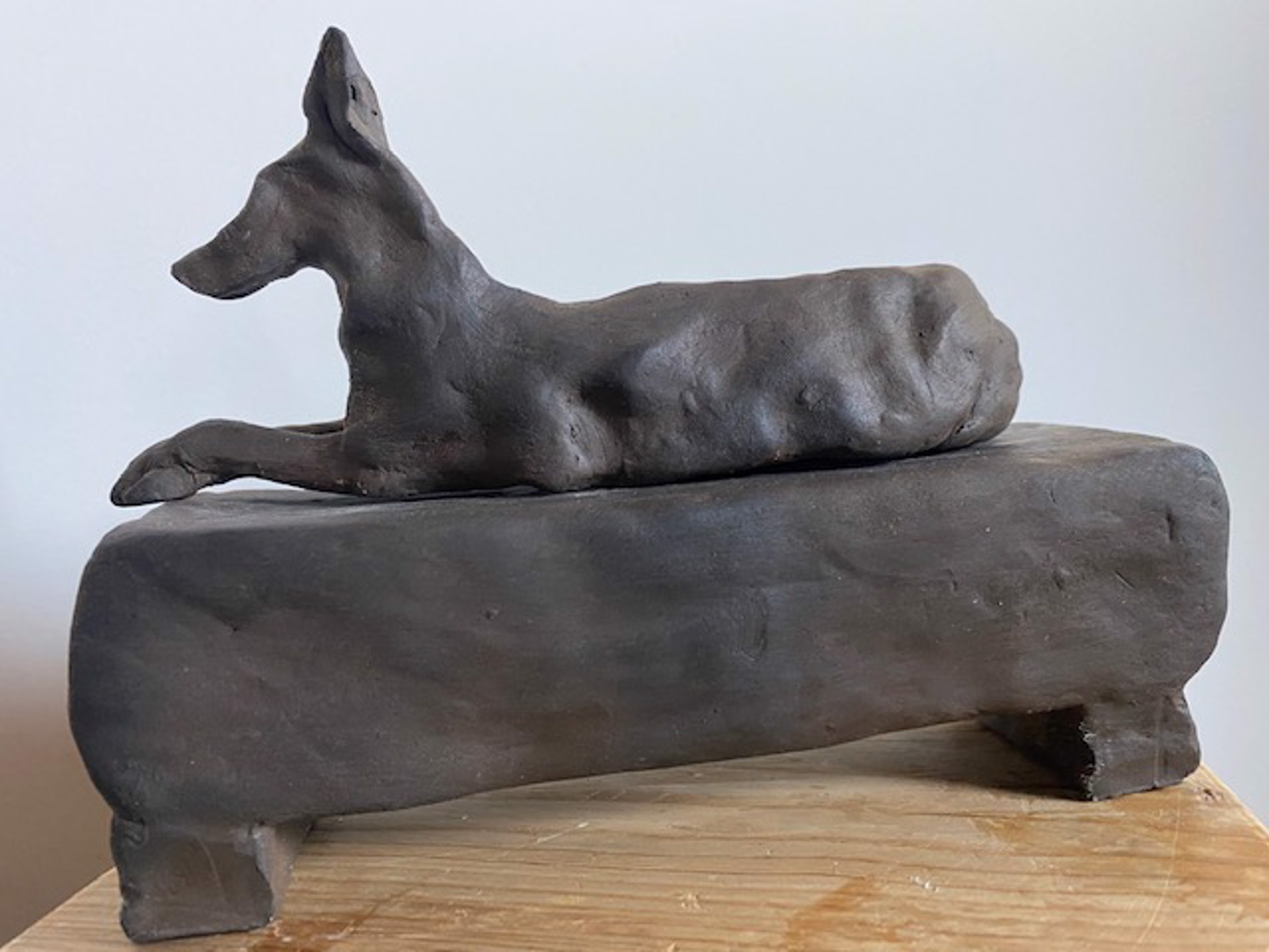 Dog with Crossed Paws by Gigi Mills