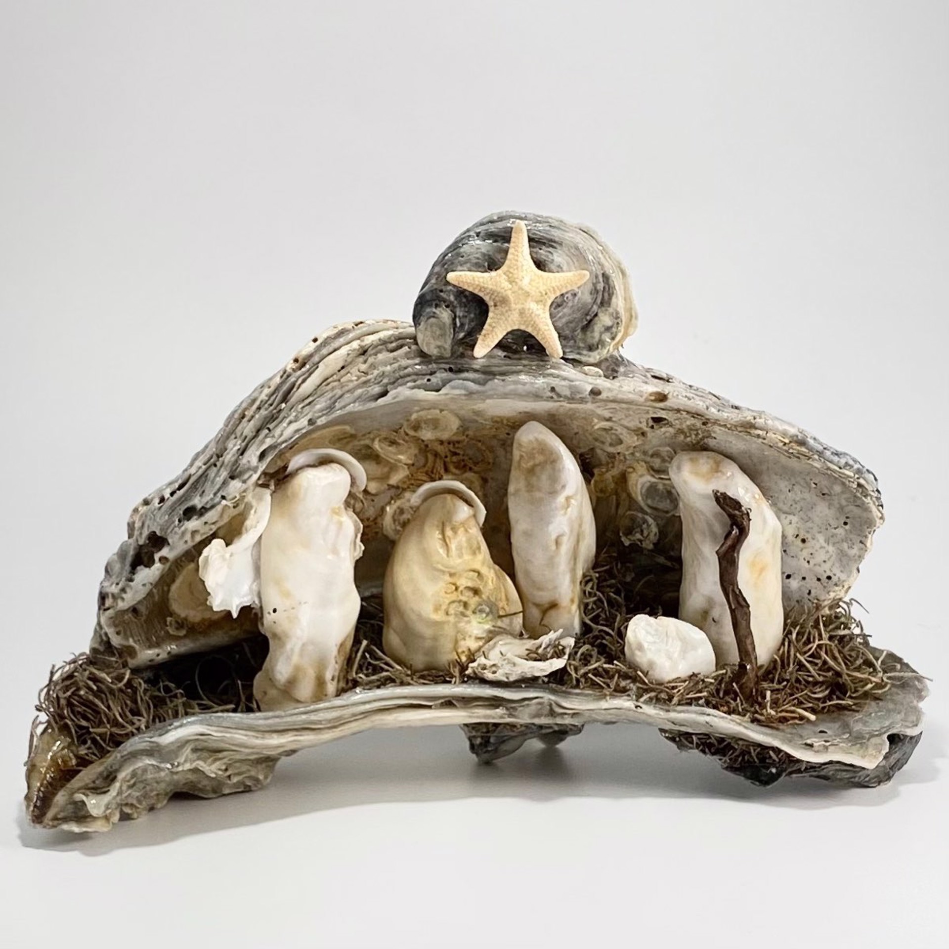 CN22-25  Creche From The Sea~Oyster Shell by Chris Nietert