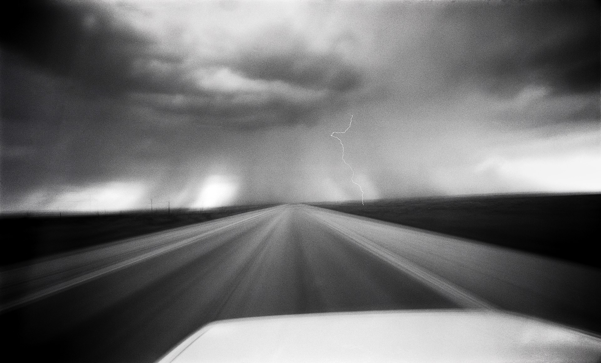 Lightning Storm, Highway 84, 70 M.P.H., New Mexico by Lawrence McFarland