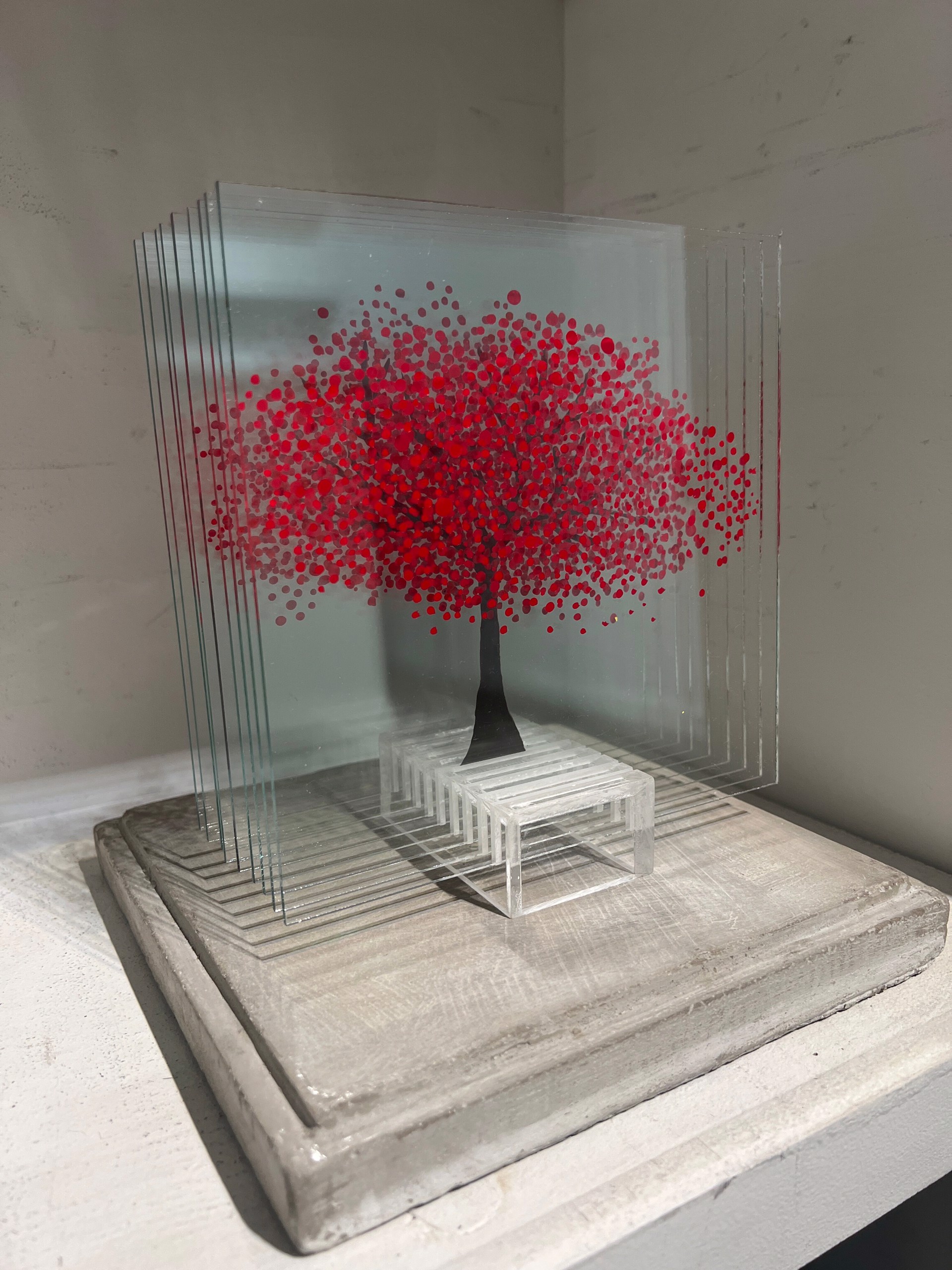 Red Tree on a stand by Ardan Özmenoğlu