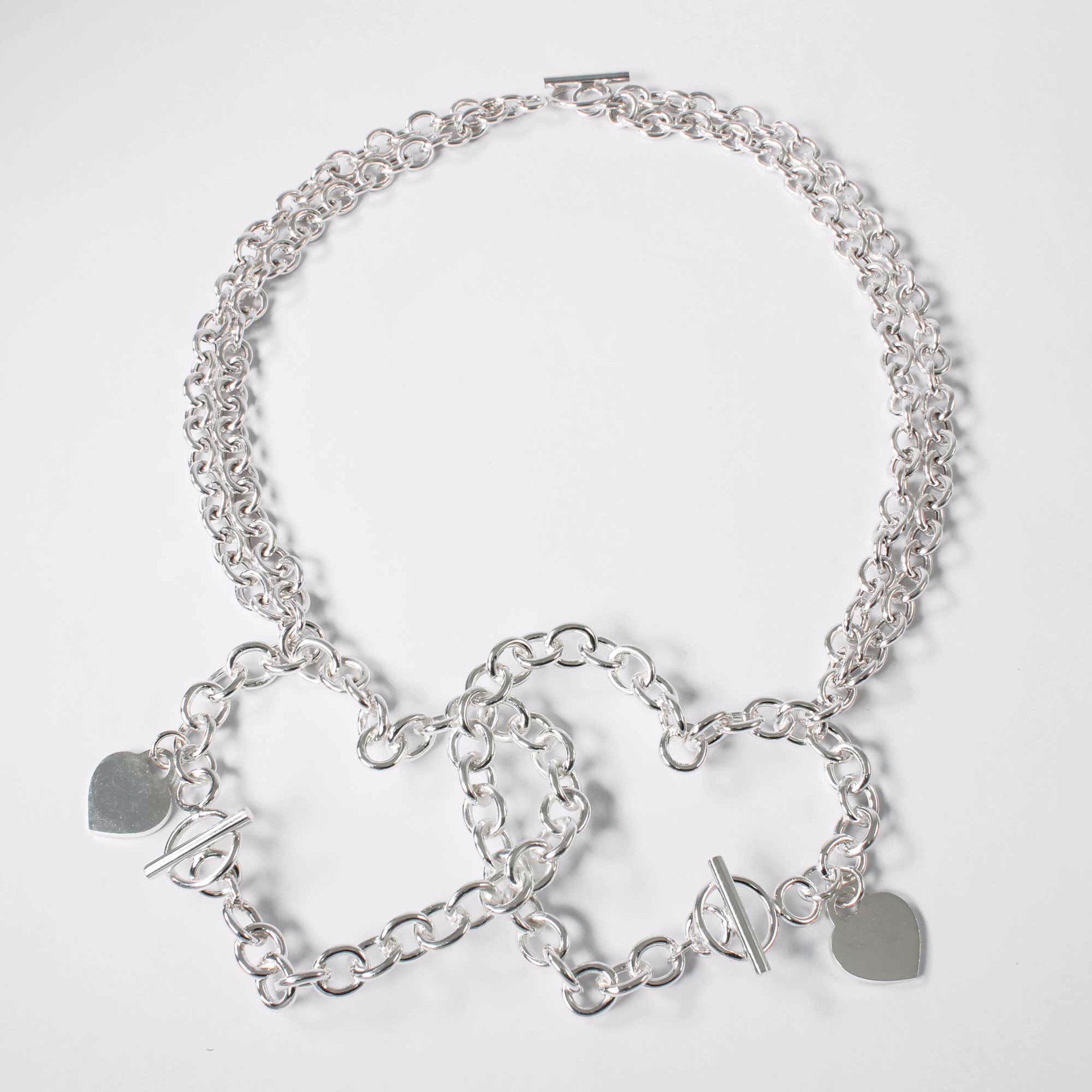 Double Clasped Heart Necklace by Amelia Toelke