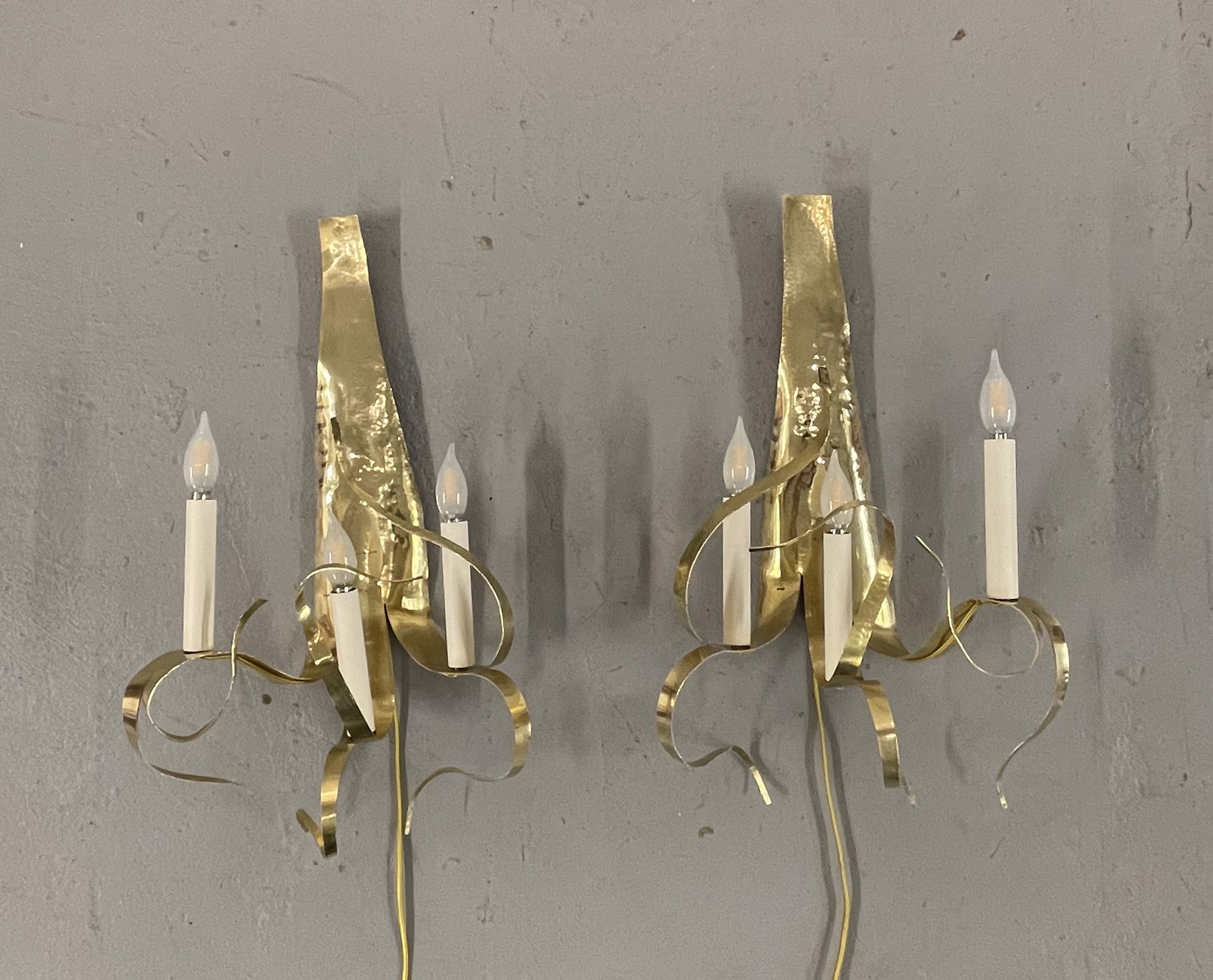 Wall lights in brass "Fori" by Jacques Jarrige