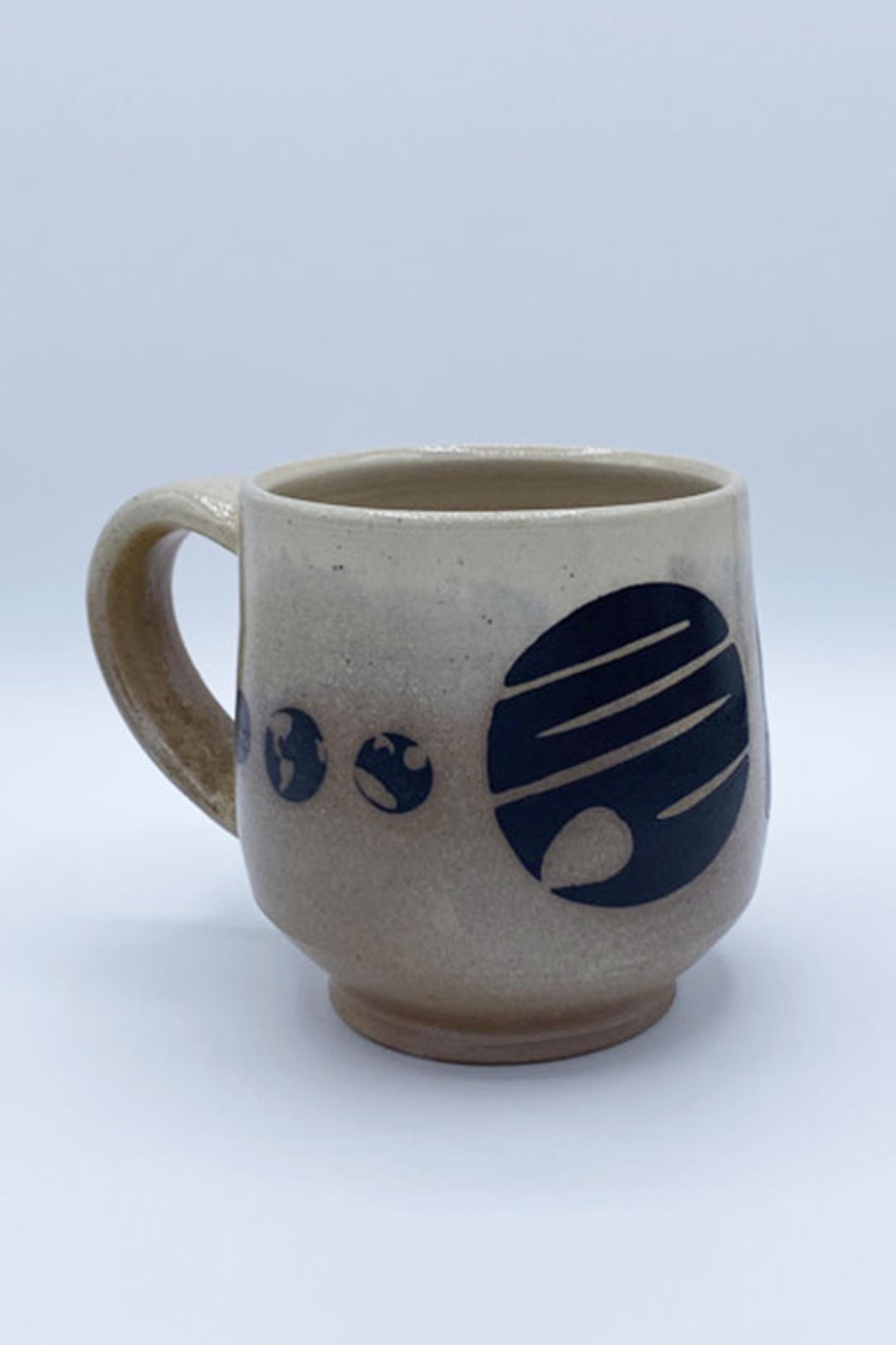 Planet Mug by Laura Cooke