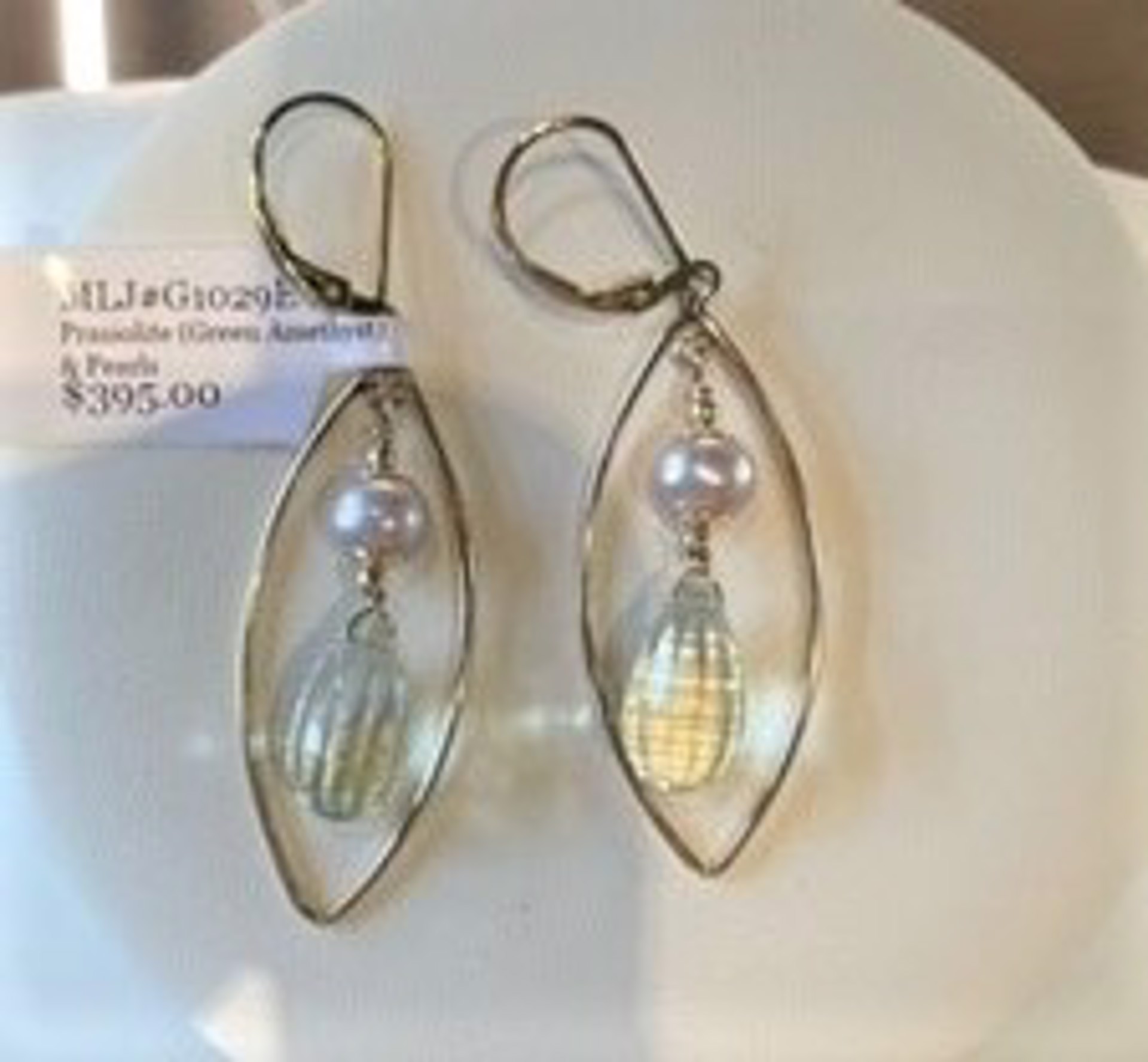Checkerboard cut prasiolite (green amethyst) briolettes with pearls in marquise shaped 14k gold-filled hoops by Melinda Lawton Jewelry