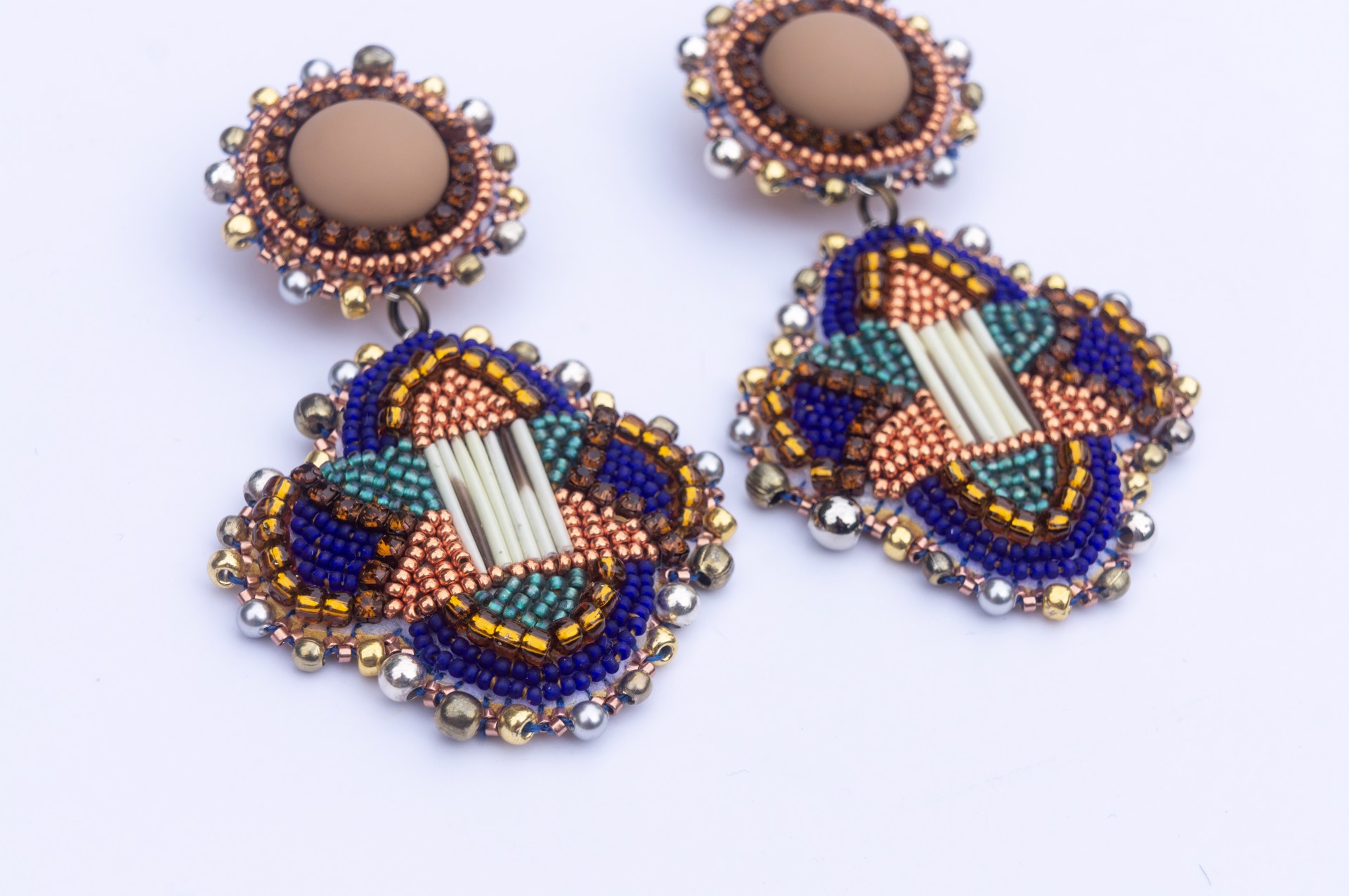 Quilled and beaded earrings by Hattie Lee Mendoza