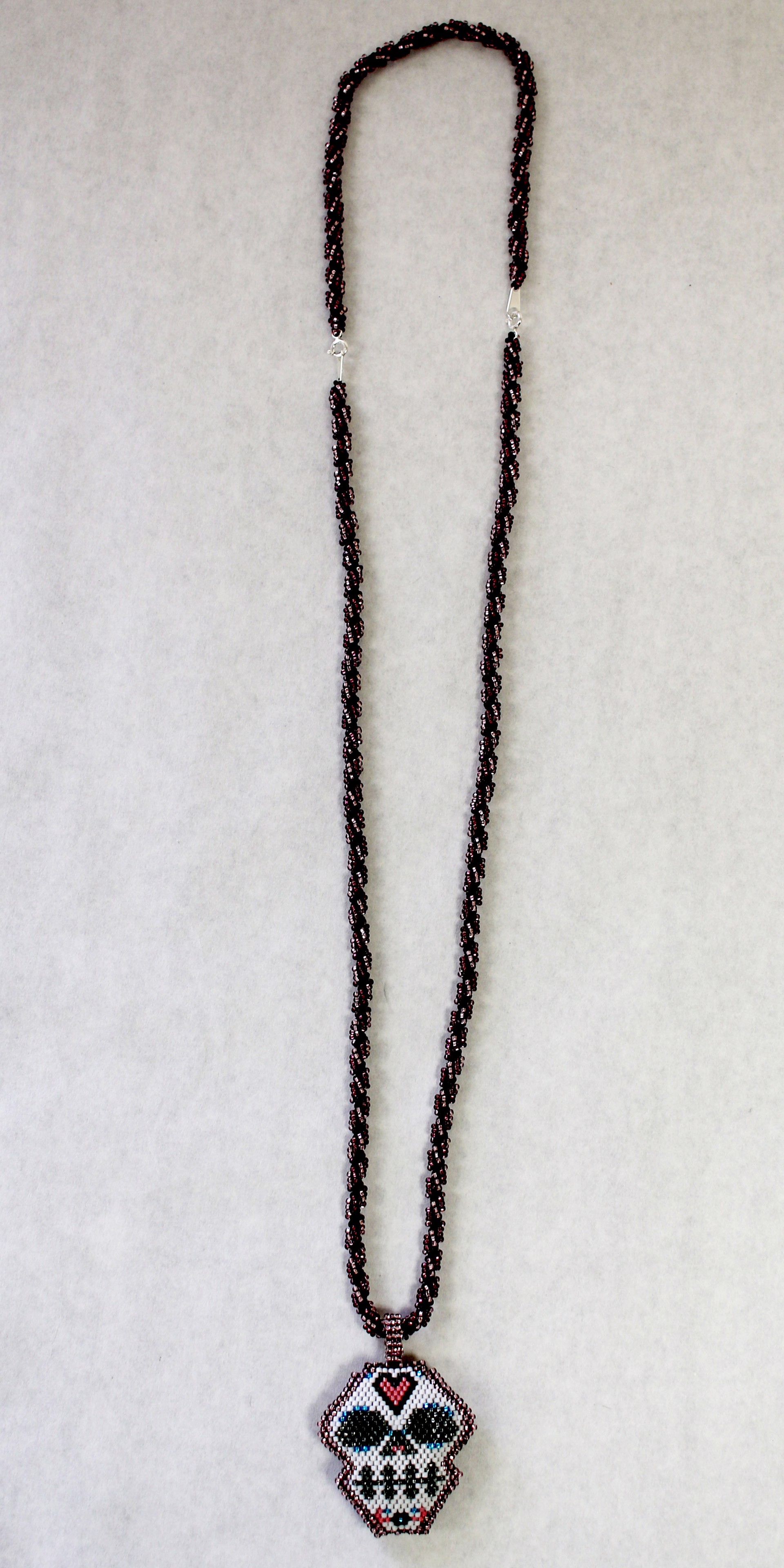 Santa Muerte Spiral Necklace & Bracelet by Julian "Good Medicine" Vigil